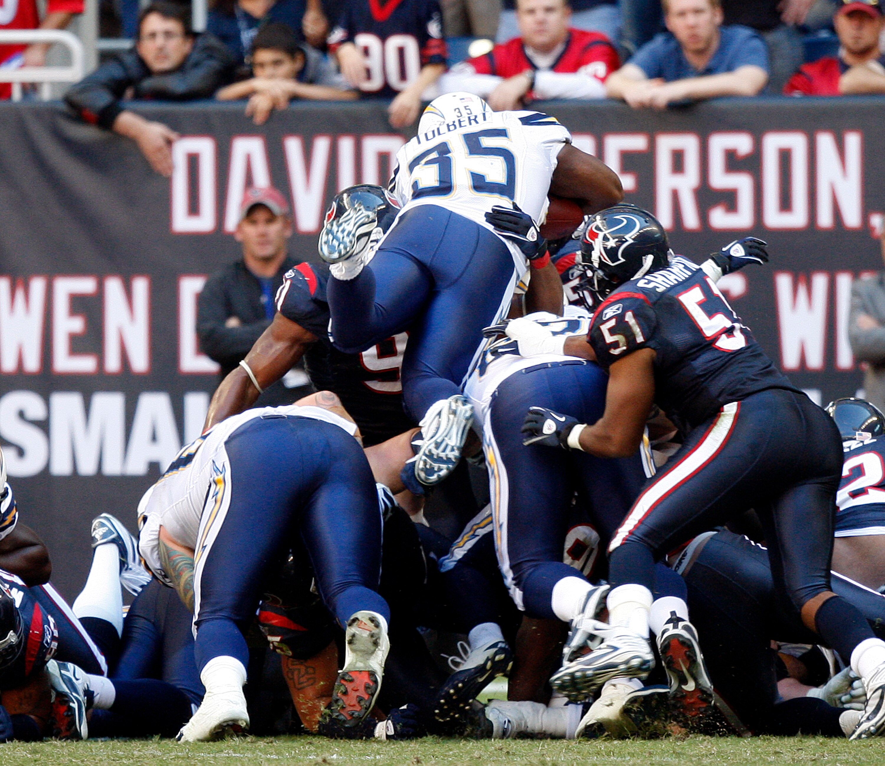 HOUSTON - NOVEMBER 07:  Running back Mike Tolbert #35 of the San Diego Chargers leaps over he top to complete a two point conversion against the Houston Texans at Reliant Stadium on November 7, 2010 in Houston, Texas.  (Photo by Bob Levey/Getty Images)