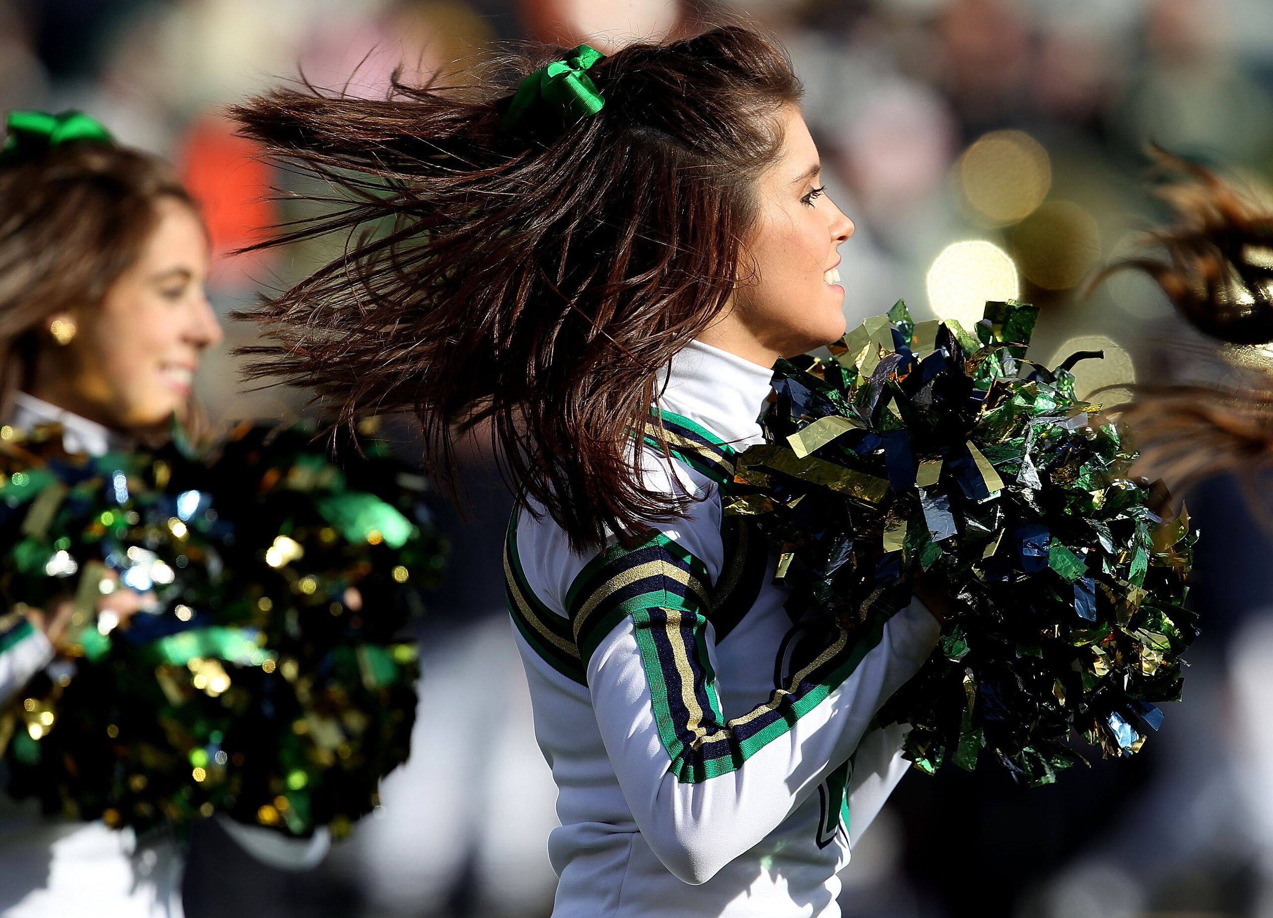 SOUTH BEND, IN - OCTOBER 30: Cheerleaders for the Notre Dame Fighting Irish perform during a game against the Tulsa Golden Hurricane at Notre Dame Stadium on October 30, 2010 in South Bend, Indiana. Tulsa defeated Notre Dame 28-27. (Photo by Jonathan Dani