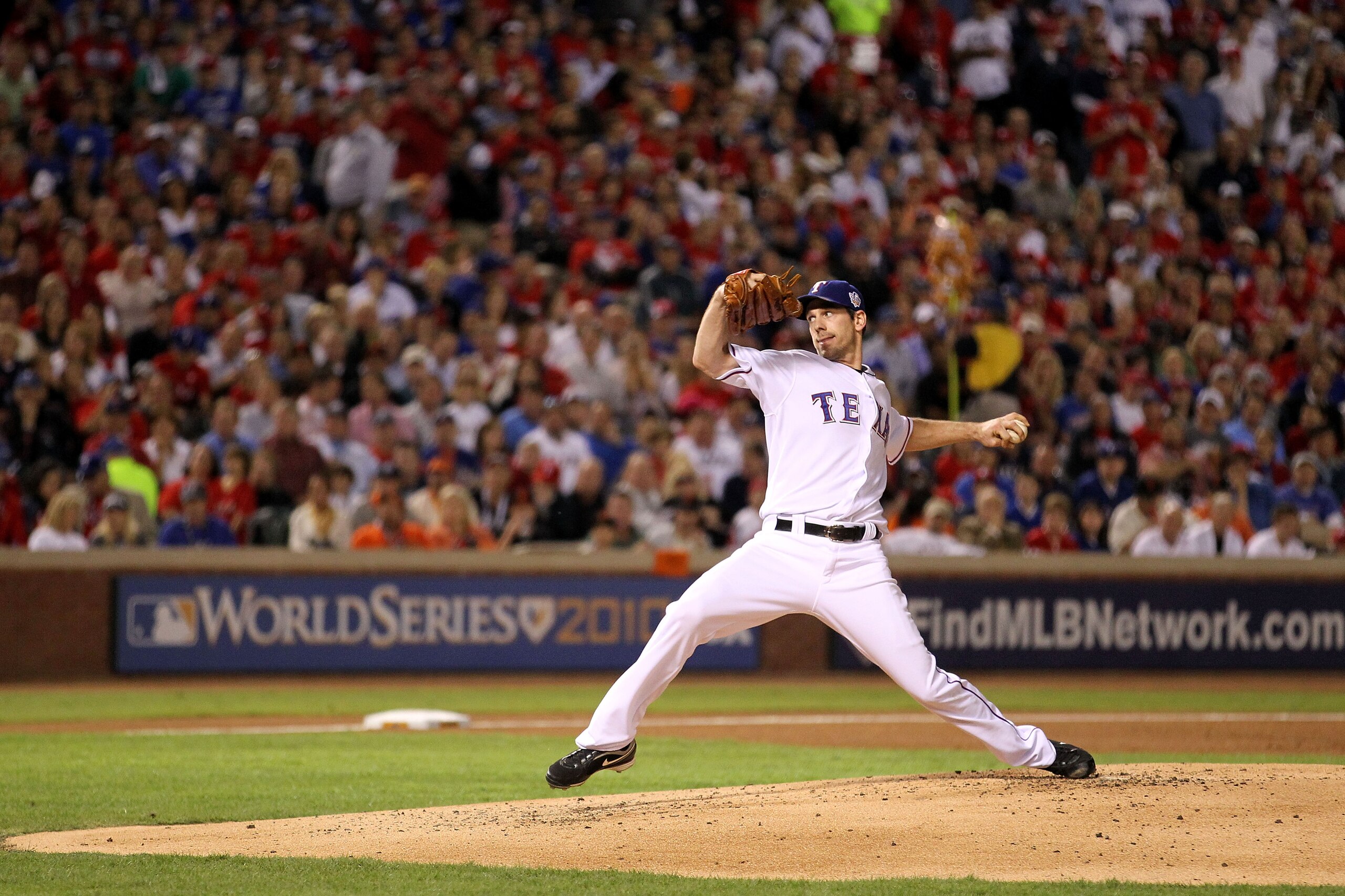 ARLINGTON, TX - NOVEMBER 01:  Starting pitcher Cliff Lee #33 of the Texas Rangers pitches against the San Francisco Giants in Game Five of the 2010 MLB World Series at Rangers Ballpark in Arlington on November 1, 2010 in Arlington, Texas. The Giants won 3