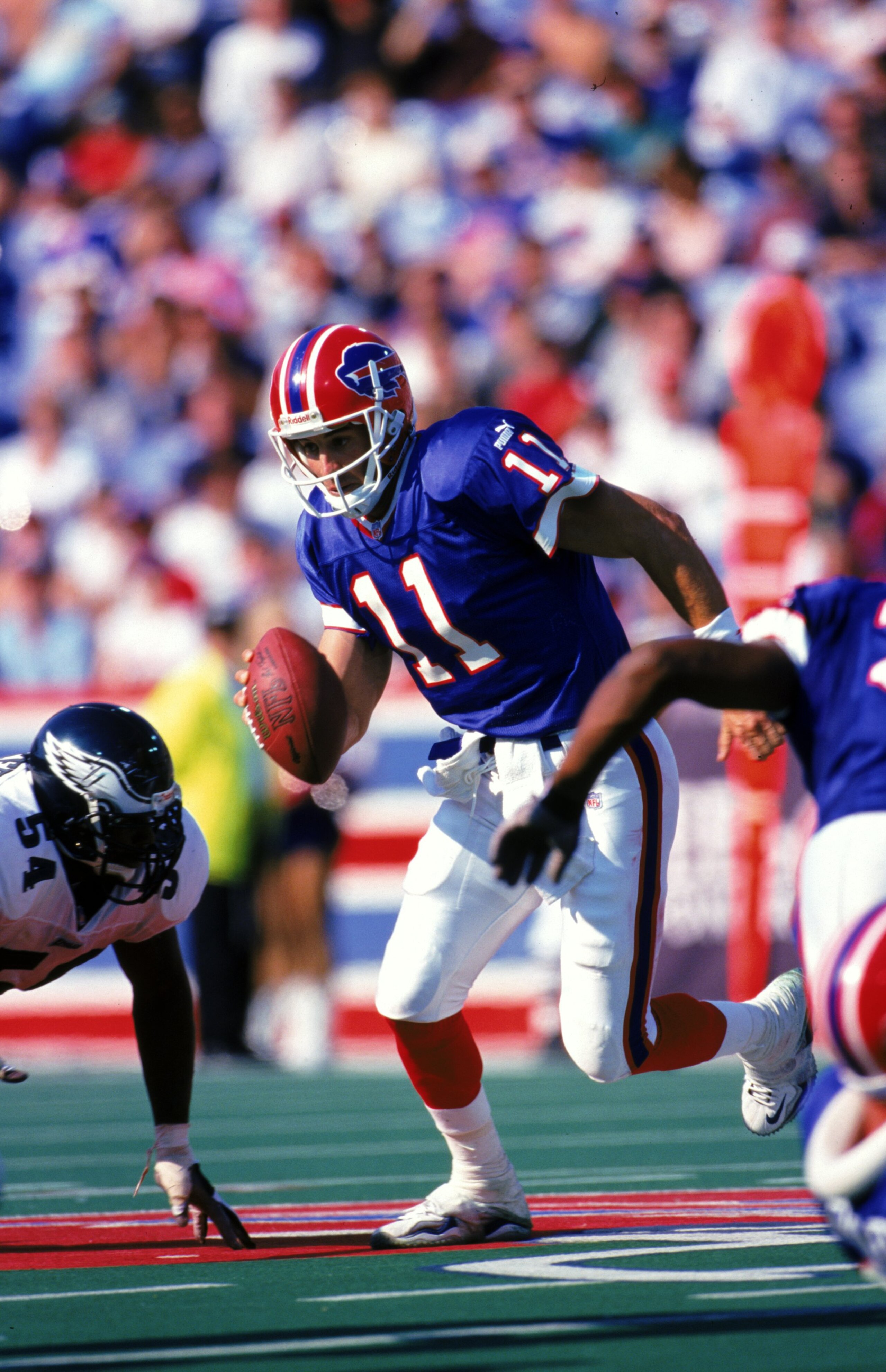 26 Sep 1999:  Rob Johnson #11 of the Buffalo Bills runs with the ball during the game against the Philadelphia Eagles at the Ralph Wilson Stadium in Orchard Park, New York. The Bills defeated the Eagles 26-0. Mandatory Credit: Rick Stewart  /Allsport