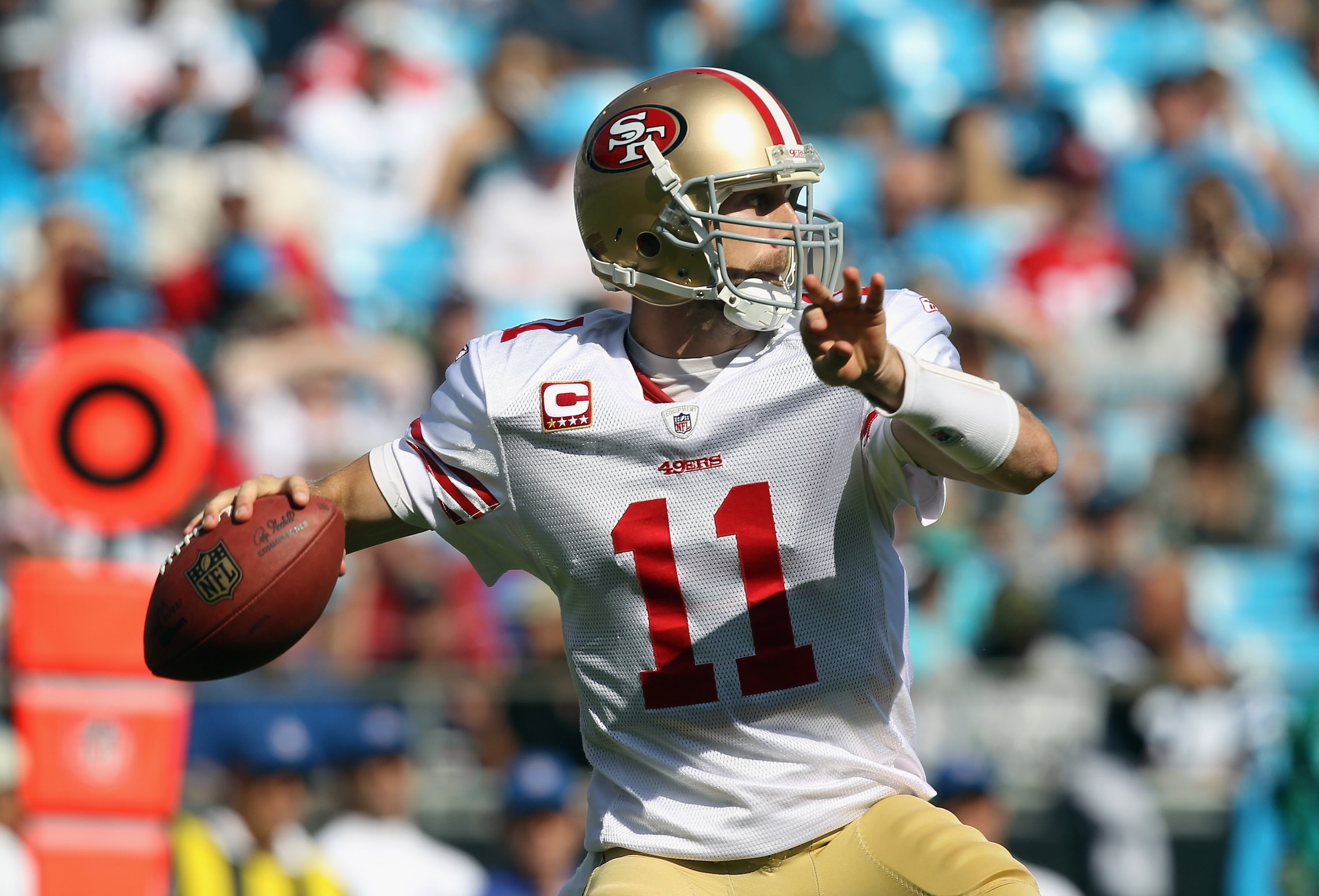 CHARLOTTE, NC - OCTOBER 24:  Alex Smith #11 of the San Francisco 49ers against the Carolina Panthers during their game at Bank of America Stadium on October 24, 2010 in Charlotte, North Carolina.  (Photo by Streeter Lecka/Getty Images)