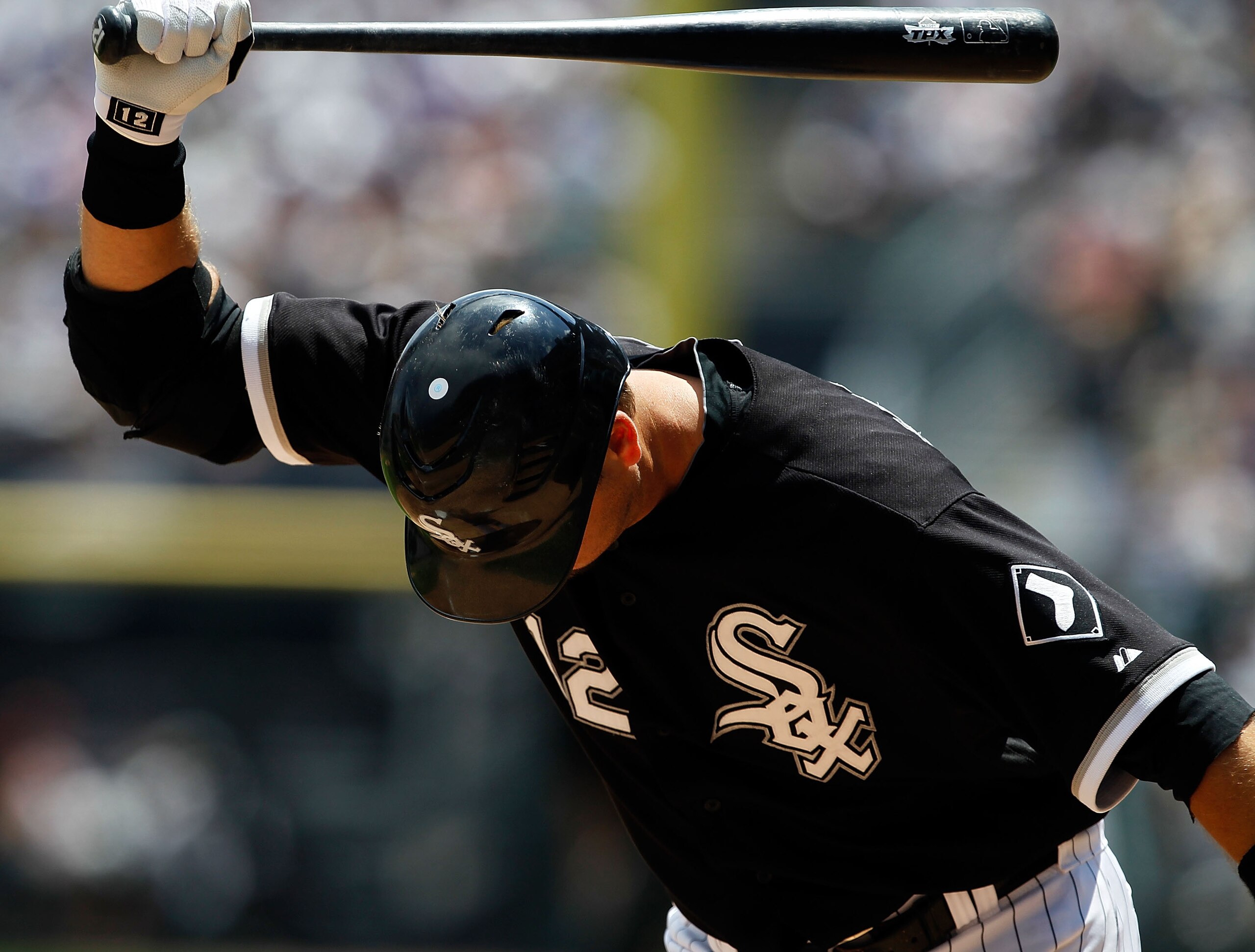 CHICAGO - JUNE 27: A.J. Pierzynski #12 of the Chicago White Sox throws and breaks his bat after striking out to end the 1st inning against the Chicago Cubs at U.S. Cellular Field on June 27, 2010 in Chicago, Illinois. (Photo by Jonathan Daniel/Getty Image