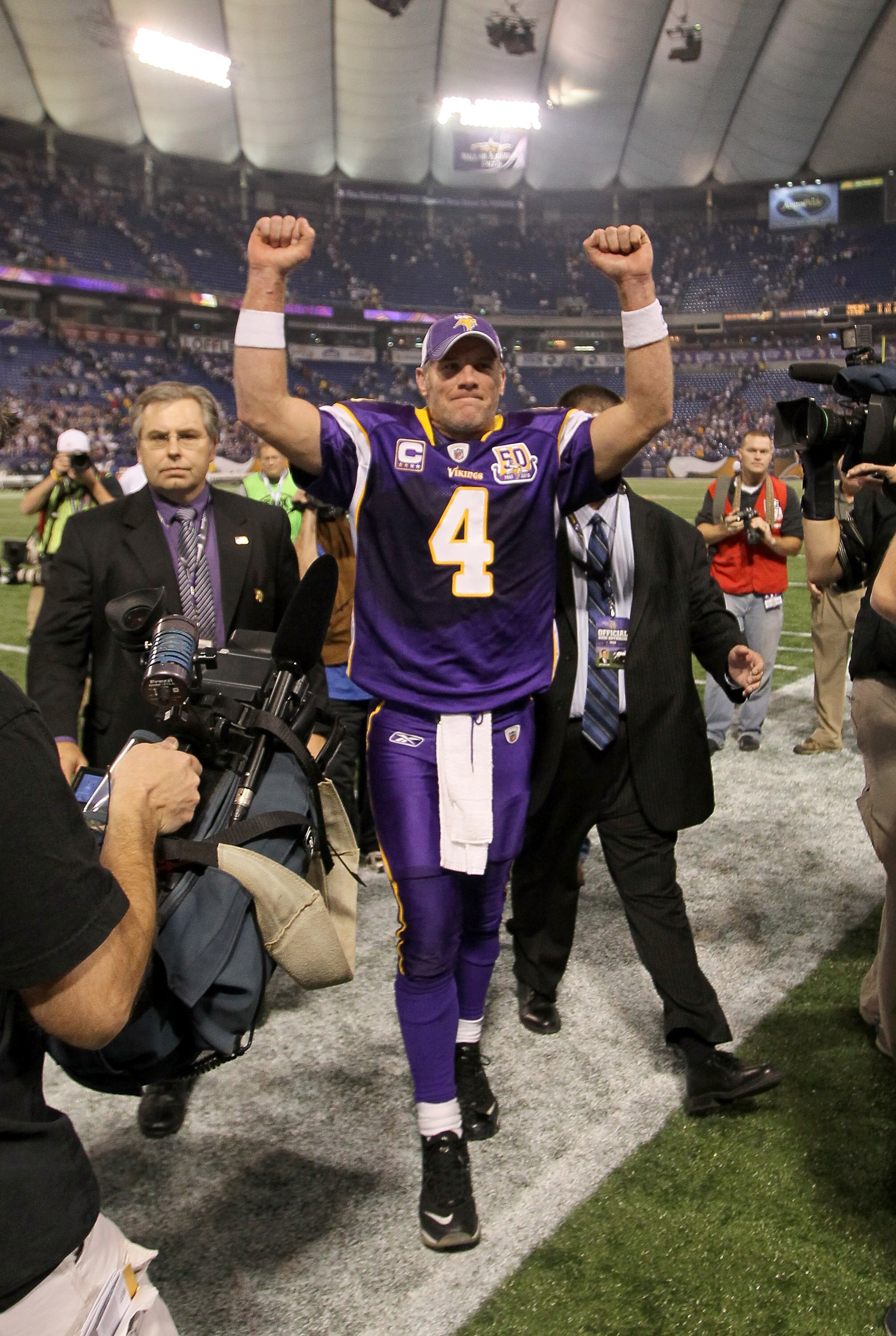 MINNEAPOLIS - NOVEMBER 07:  Quarterback Brett Favre #4 of the Minnesota Vikings celebrates as he heaves the field after the game with the Arizona Cardinals at Hubert H. Humphrey Metrodome on November 7, 2010 in Minneapolis, Minnesota.  The Vikings won 27-