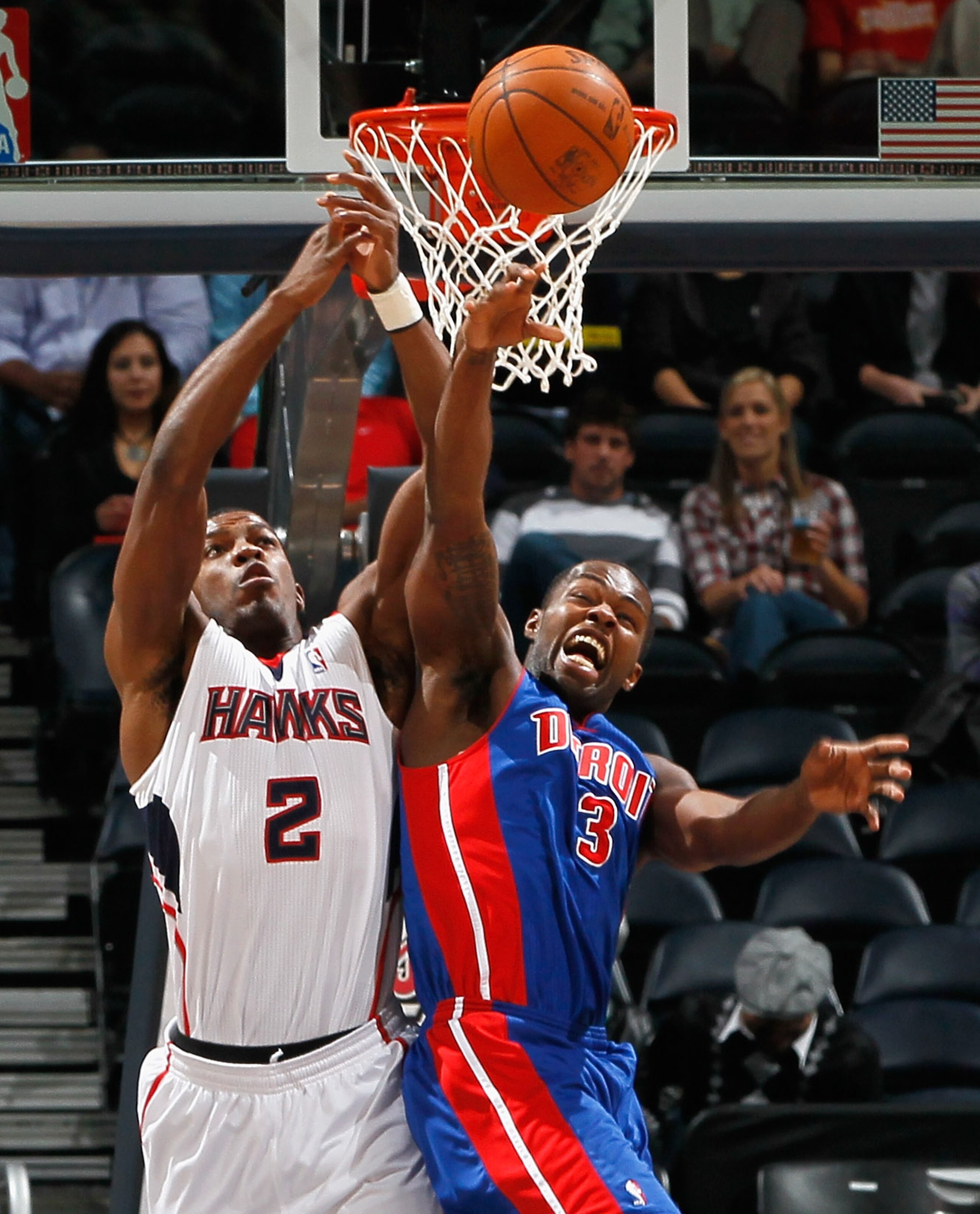 ATLANTA - NOVEMBER 03:  Joe Johnson #2 of the Atlanta Hawks battles for a rebound against Rodney Stuckey #3 of the Detroit Pistons at Philips Arena on November 3, 2010 in Atlanta, Georgia.  NOTE TO USER: User expressly acknowledges and agrees that, by dow