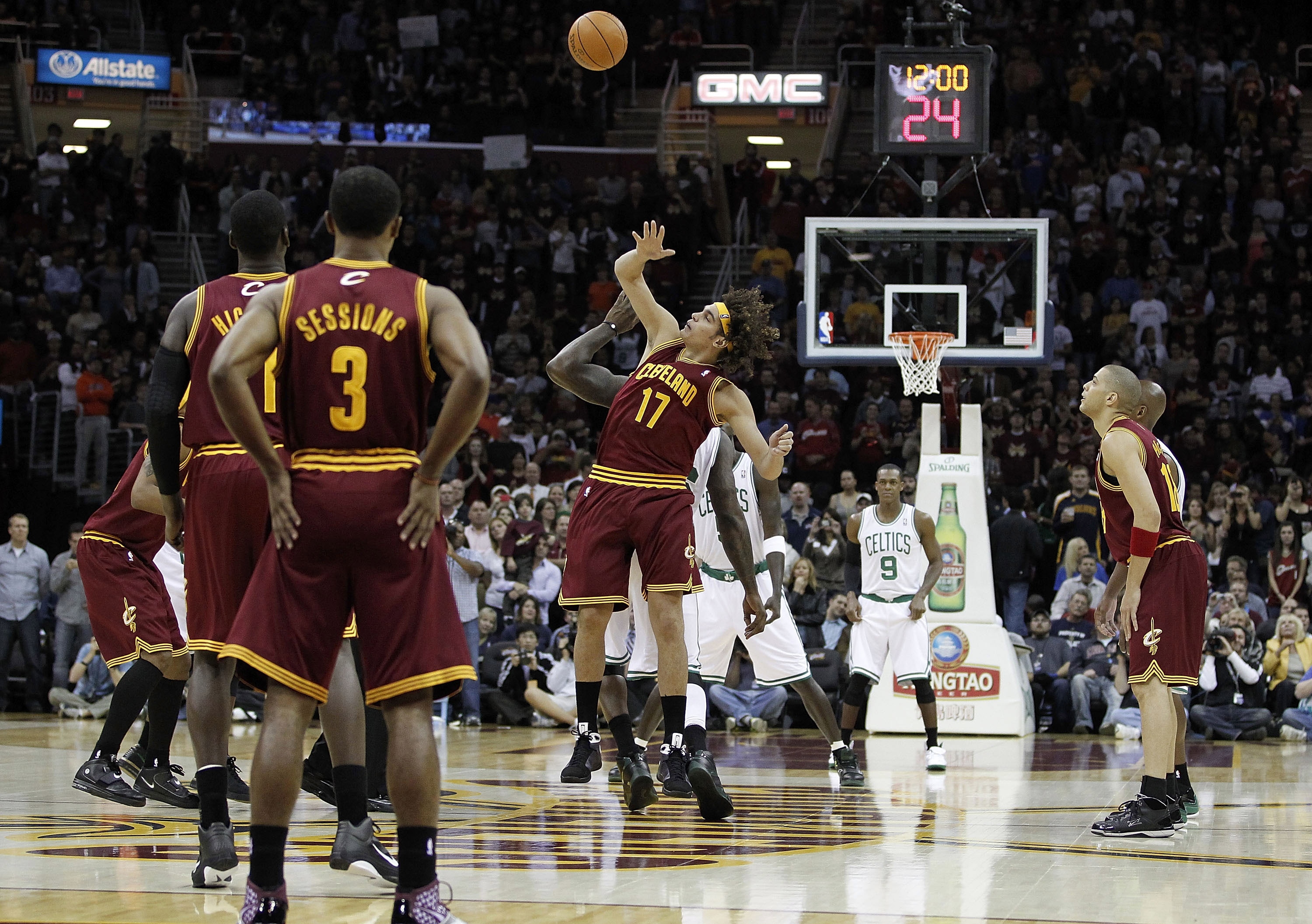 CLEVELAND - OCTOBER 27: Anderson Varejao #17 of the Cleveland Cavaliers tips a jump ball in front of Shaquille O'Neal #36 of the Boston Celtics to start the 2010 season at Quicken Loans Arena on October 27, 2010 in Cleveland, Ohio.  (Photo by Gregory Sham