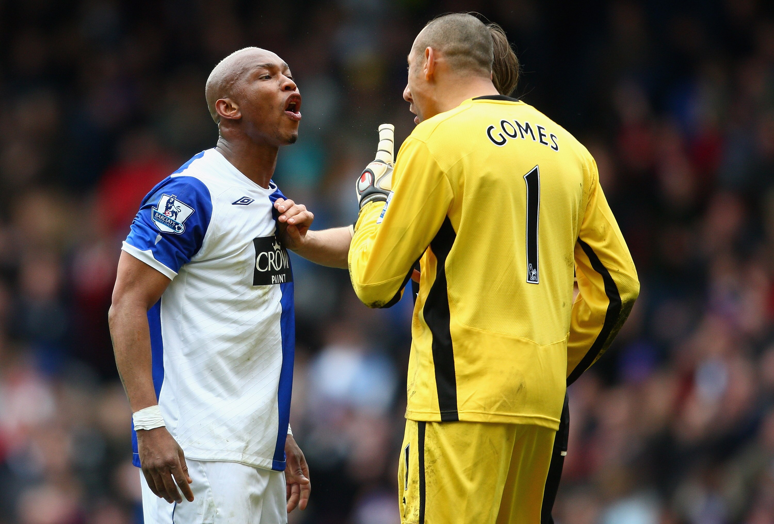 BLACKBURN, UNITED KINGDOM - APRIL 04:  El Hadji Diouf of Blackburn Rovers argues with Huerelho Gomes and Jonathan Woodgate of Tottenham Hotspur during the Barclays Premier League match between Blackburn Rovers and Tottenham Hotspur at Ewood Park on April