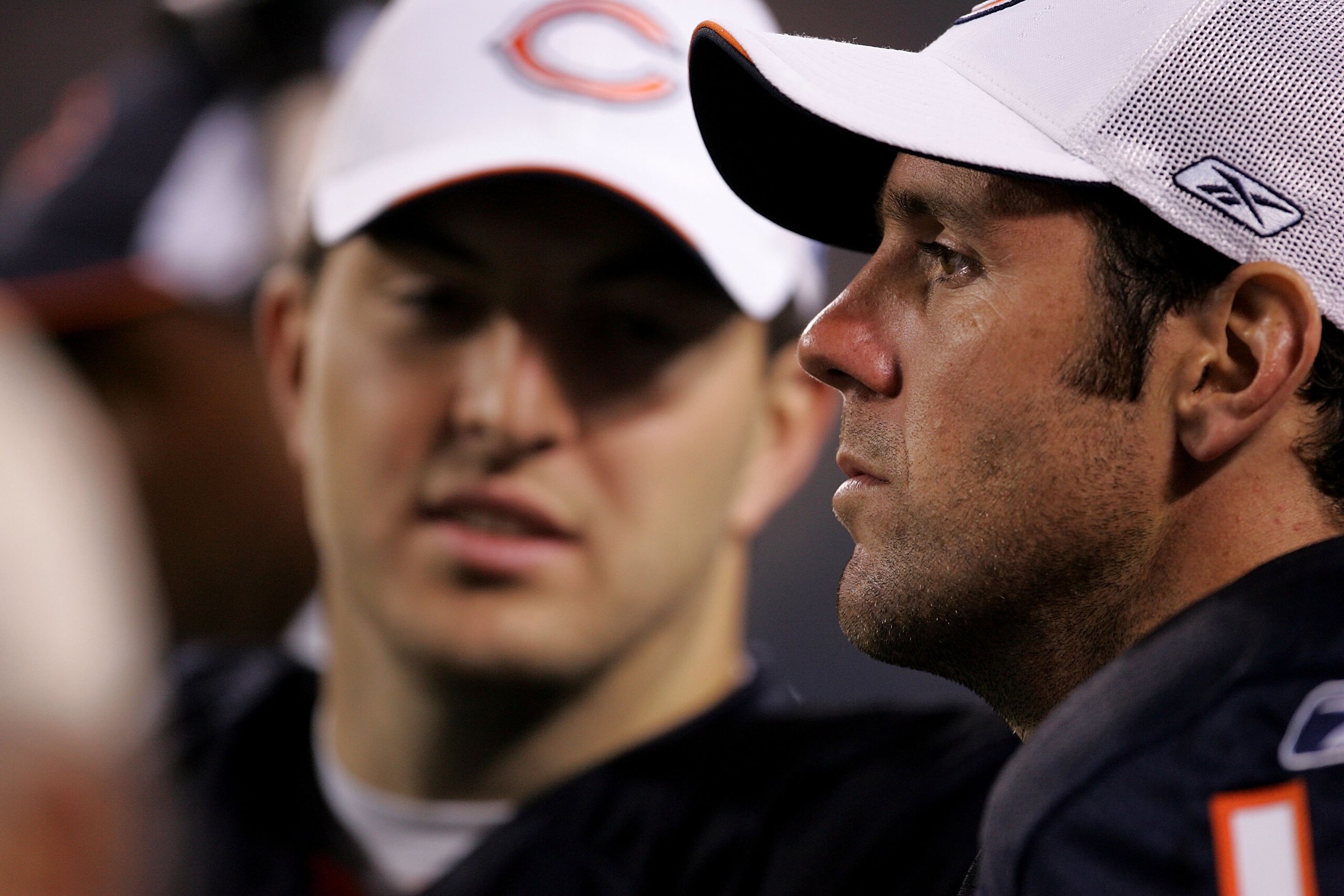 CHICAGO - AUGUST 18:  Brian Griese #14 (R) and Rex Grossman #8 of the Chicago Bears watch from the sidelines during a game against the San Diego Chargers on August 18, 2006 at Soldier Field in Chicago, Illinois.  The Bears defeated the Chargers 24-3.  (Ph