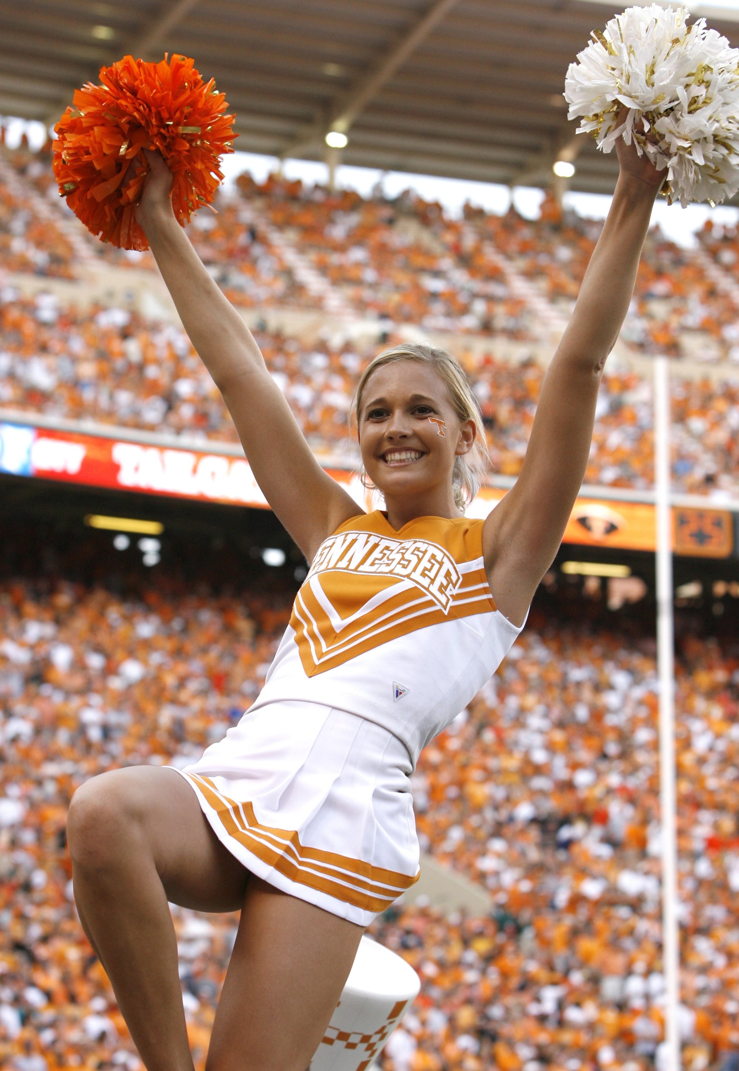 KNOXVILLE, TN - SEPTEMBER 12: A cheerleader for the Tennessee Volunteers cheers against the UCLA Bruins on September 12, 2009 at Neyland Stadium in Knoxville, Tennessee. UCLA beat Tennessee 19-15. (Photo by Joe Murphy/Getty Images)