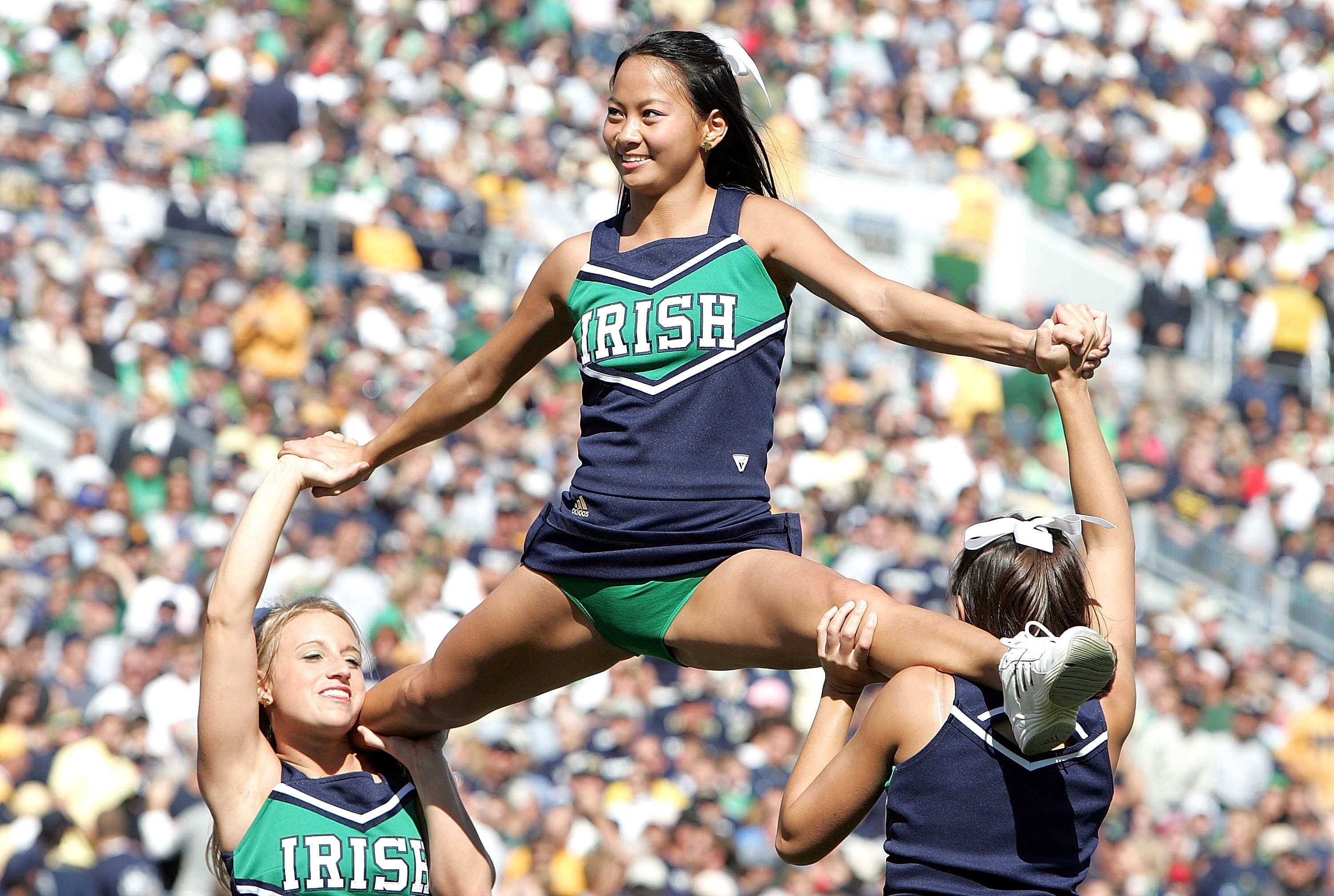 SOUTH BEND, IN - OCTOBER 07:  Cheerleaders for Notre Dame Fighting Irish perform during the game against the Stanford Cardinal on October 7, 2006 at Notre Dame Stadium in South Bend, Indiana.  (Photo by Andy Lyons/Getty Images)