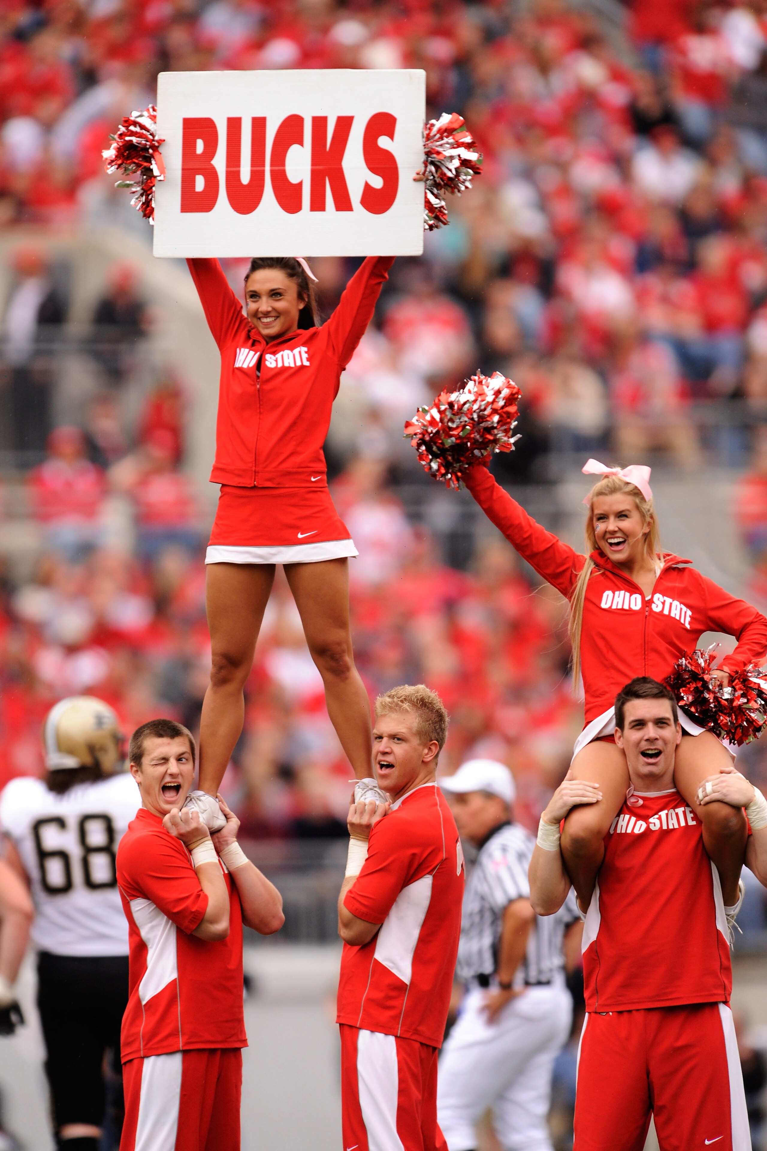 COLUMBUS, OH - OCTOBER 23:  Ohio State Buckeyes cheerleaders rally the crowd in the second half during a game against the Purdue Boilermakers at Ohio Stadium on October 23, 2010 in Columbus, Ohio.  (Photo by Jamie Sabau/Getty Images)