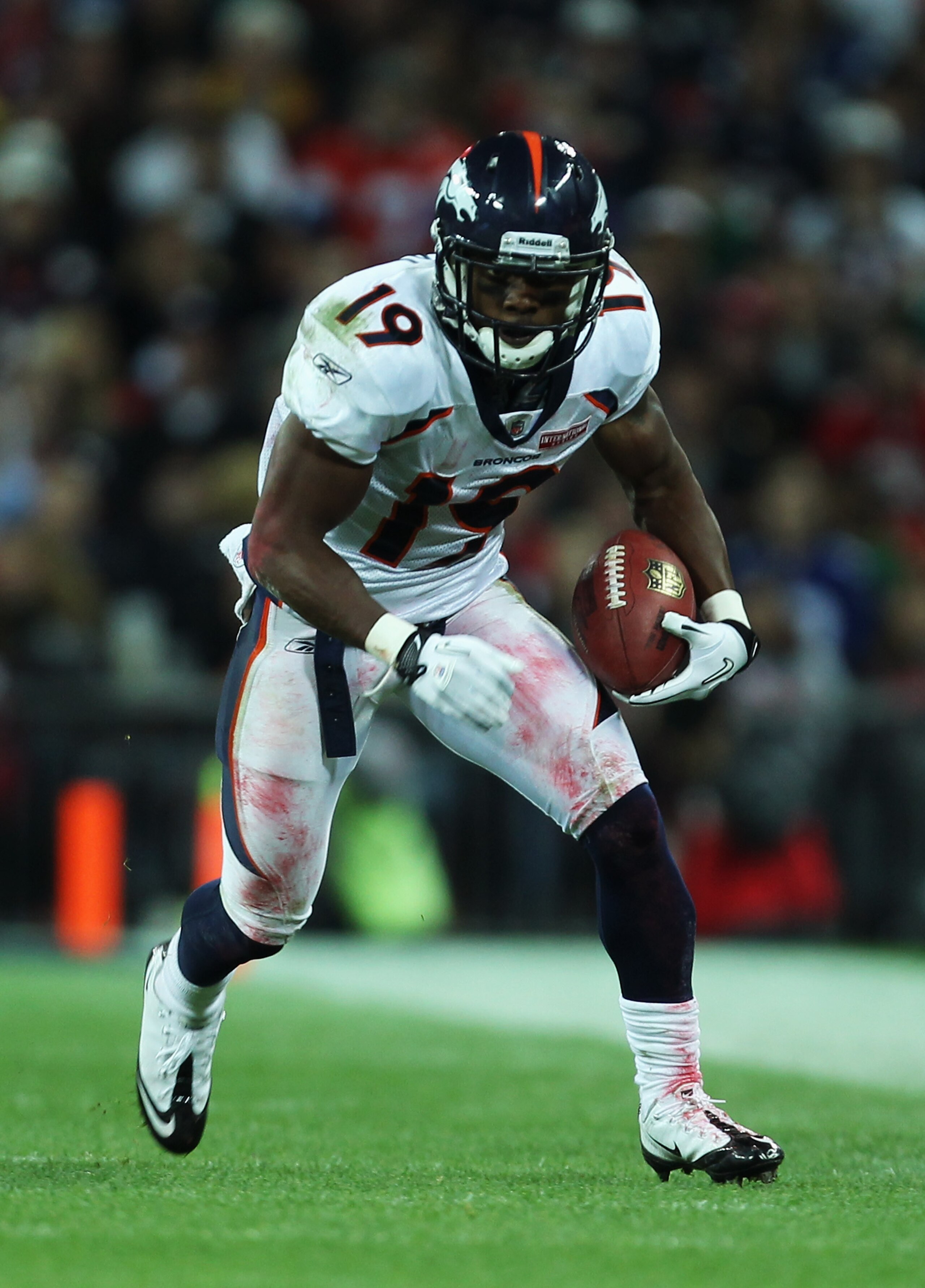 LONDON, ENGLAND - OCTOBER 31: Eddie Royal #19 of Denver Broncos runs with the ball during the NFL International Series match between Denver Broncos and San Francisco 49ers at Wembley Stadium on October 31, 2010 in London, England. This is the fourth occa LONDON, ENGLAND - OCTOBER 31: Eddie Royal #19 of Denver Broncos runs with the ball during the NFL International Series match between Denver Broncos and San Francisco 49ers at Wembley Stadium on October 31, 2010 in London, England. This is the fourth occa