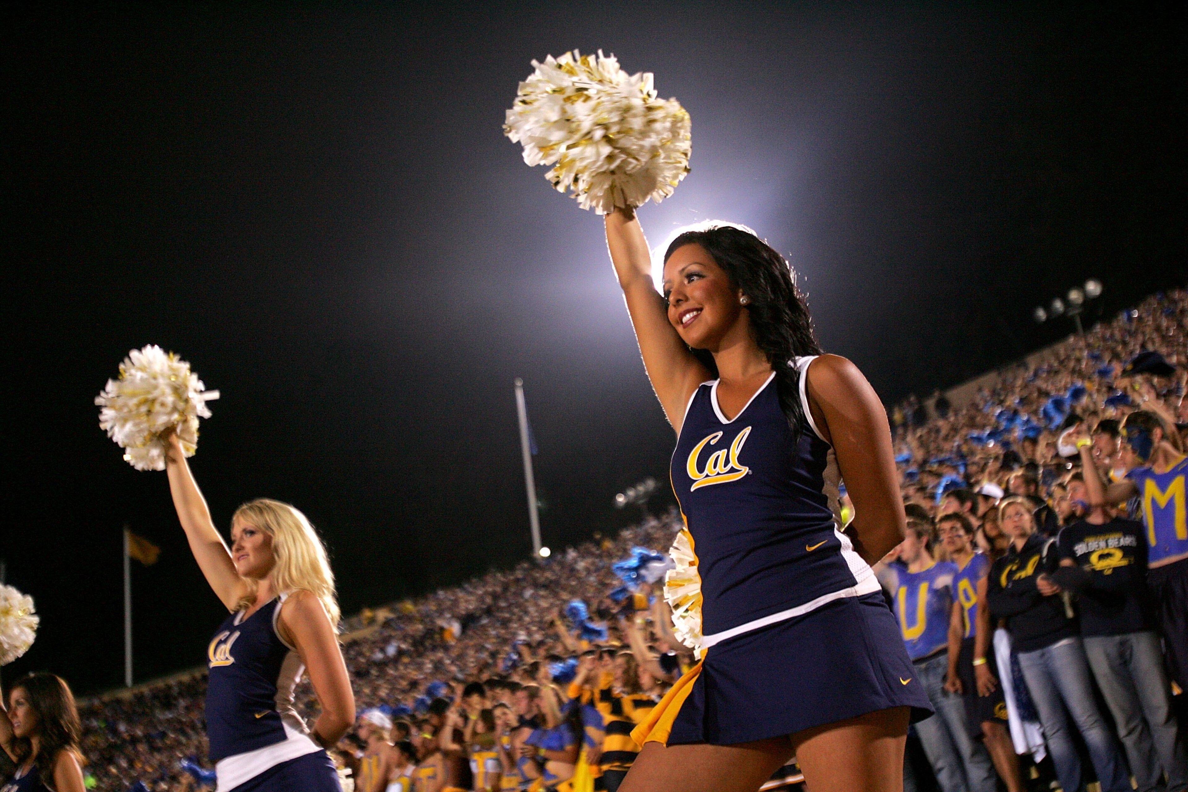 BERKELEY, CA - SEPTEMBER 05:  A cheerleader cheers for the California Golden Bears during their game against the Maryland Terrapins at California Memorial Stadium on September 5, 2009 in Berkeley, California.  (Photo by Ezra Shaw/Getty Images)