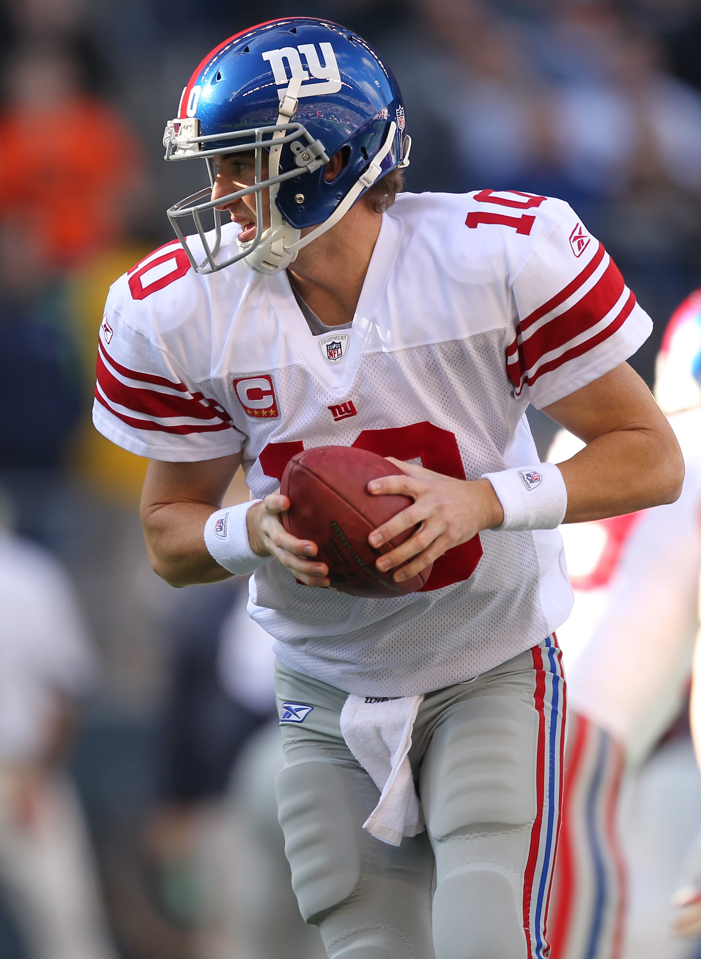 SEATTLE - NOVEMBER 07:  Quarterback Eli Manning #10 of the New York Giants drops back against the Seattle Seahawks at Qwest Field on November 7, 2010 in Seattle, Washington. The Giants defeated the Seahawks 41-7. (Photo by Otto Greule Jr/Getty Images)