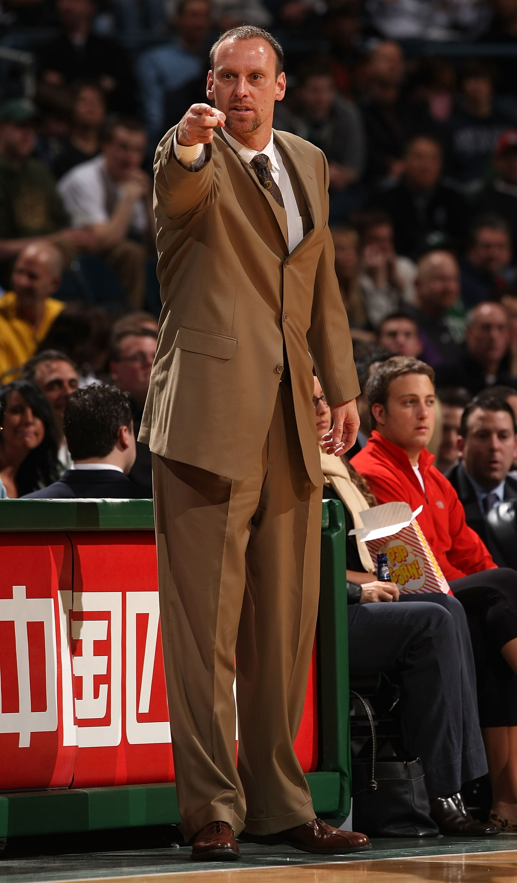 MILWAUKEE - APRIL 08: Head coach Larry Krystkowiak of the Milwaukee Bucksgives instructions to his team against of the Boston Celtics on April 8, 2008 at the Bradley Center in Milwaukee, Wisconsin. The Celktics defeated the Bucks 107-104 in overtime. NOTE