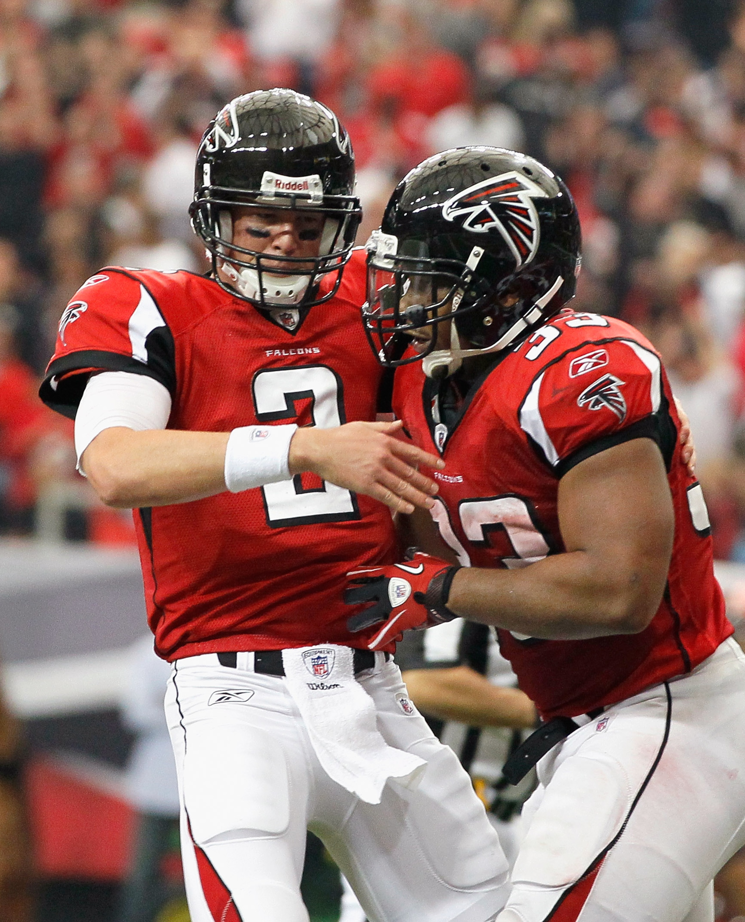 ATLANTA - NOVEMBER 07:  Quarterback Matt Ryan #2 of the Atlanta Falcons celebrates with Michael Turner #33 after Turner's touchdown against the Tampa Bay Buccaneers at Georgia Dome on November 7, 2010 in Atlanta, Georgia.  (Photo by Kevin C. Cox/Getty Ima