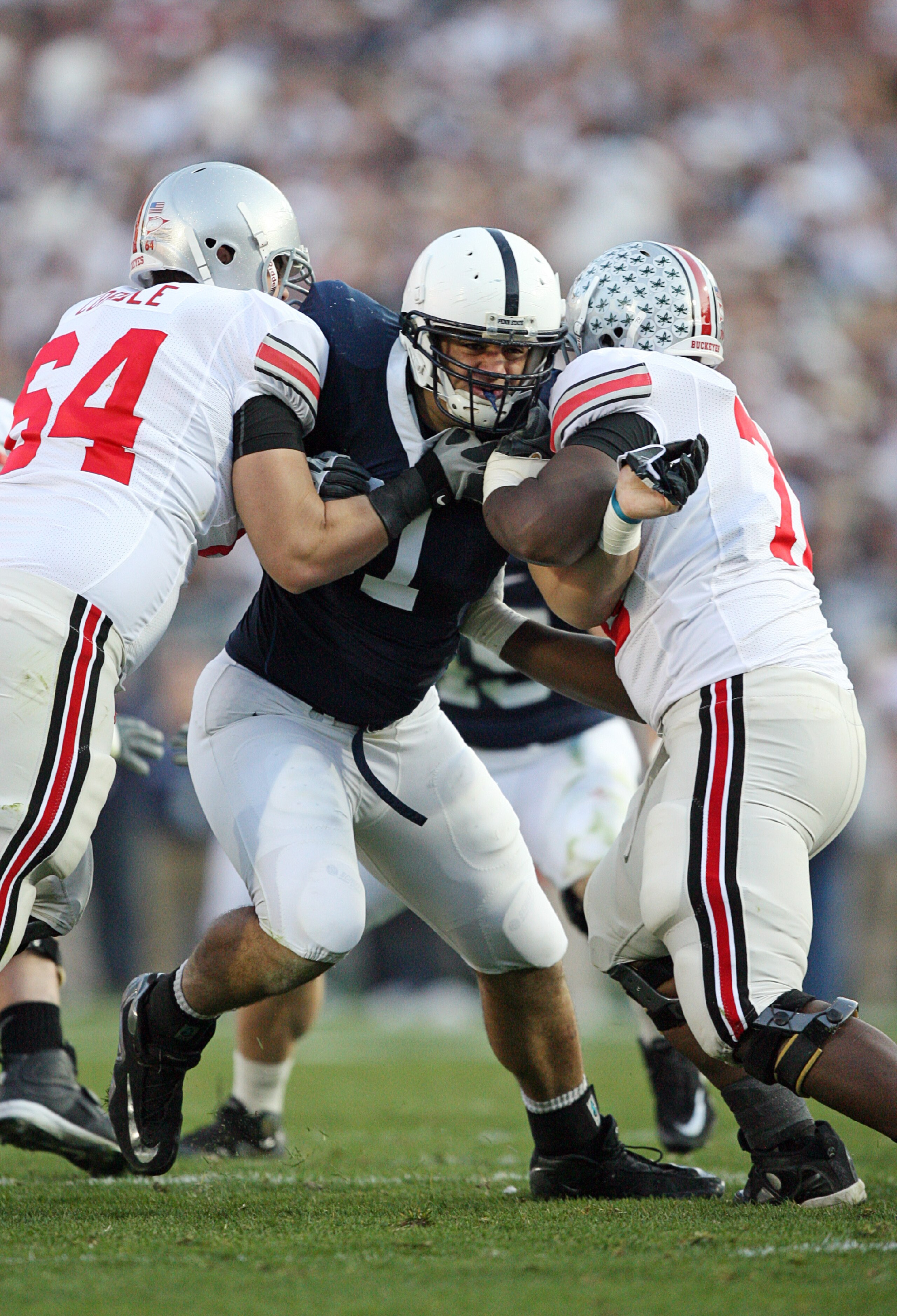 STATE COLLEGE, PA - NOVEMBER 7: Defensive tackle Jared Odrick #91 of the Penn State Nittany Lions tries to shed a double team block during a game against the Ohio State Buckeyes on November 7, 2009 at Beaver Stadium in State College, Pennsylvania. (Photo