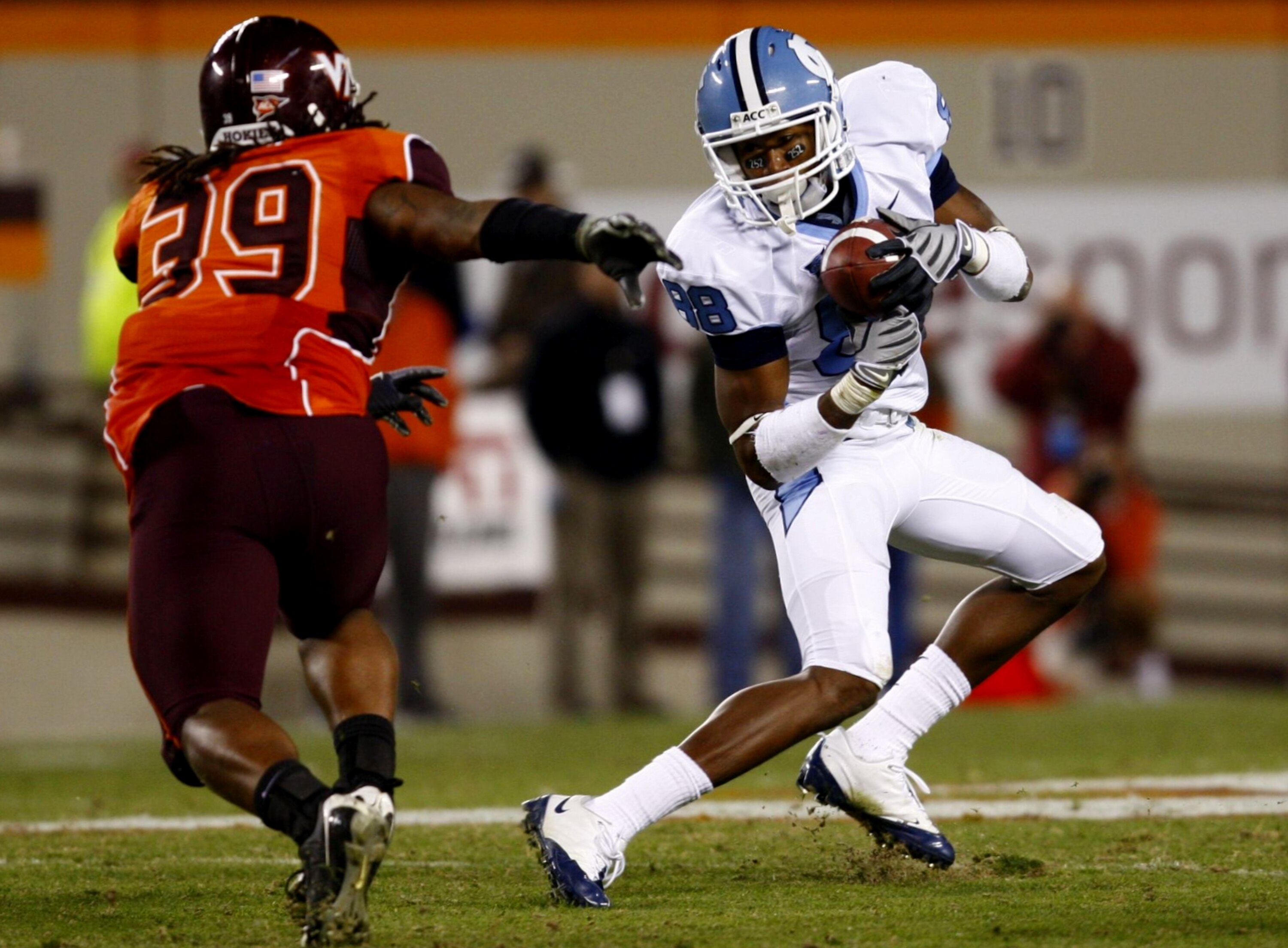 BLACKSBURG, VA - OCTOBER 29:  Wide receiver Erik Highsmith #88 of the North Carolina Tar Heels makes a catch in front of Lyndell Gibson #39 of the Virginia Tech University Hokies during the game at Lane Stadium on October 29, 2009 in Blacksburg, Virginia.