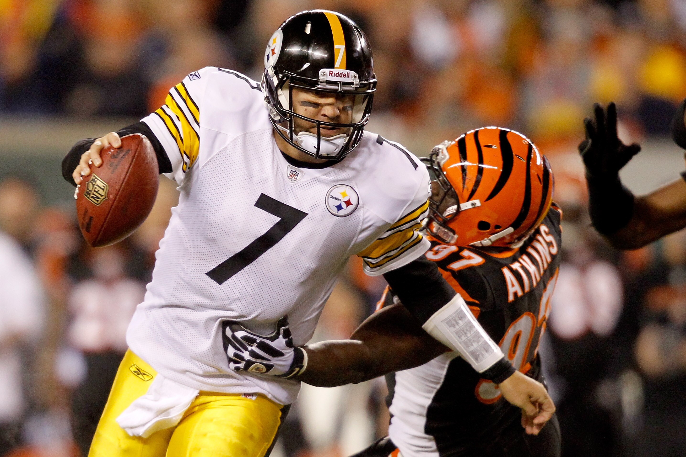 CINCINNATI - NOVEMBER 08:  Quarterback Ben Roethlisberger #7 of the Pittsburgh Steelers breaks free from Geno Atkins #97 of the Cincinnati Bengals at Paul Brown Stadium on November 8, 2010 in Cincinnati, Ohio.  The Steelers defeated the Bengals 27-21. (Ph