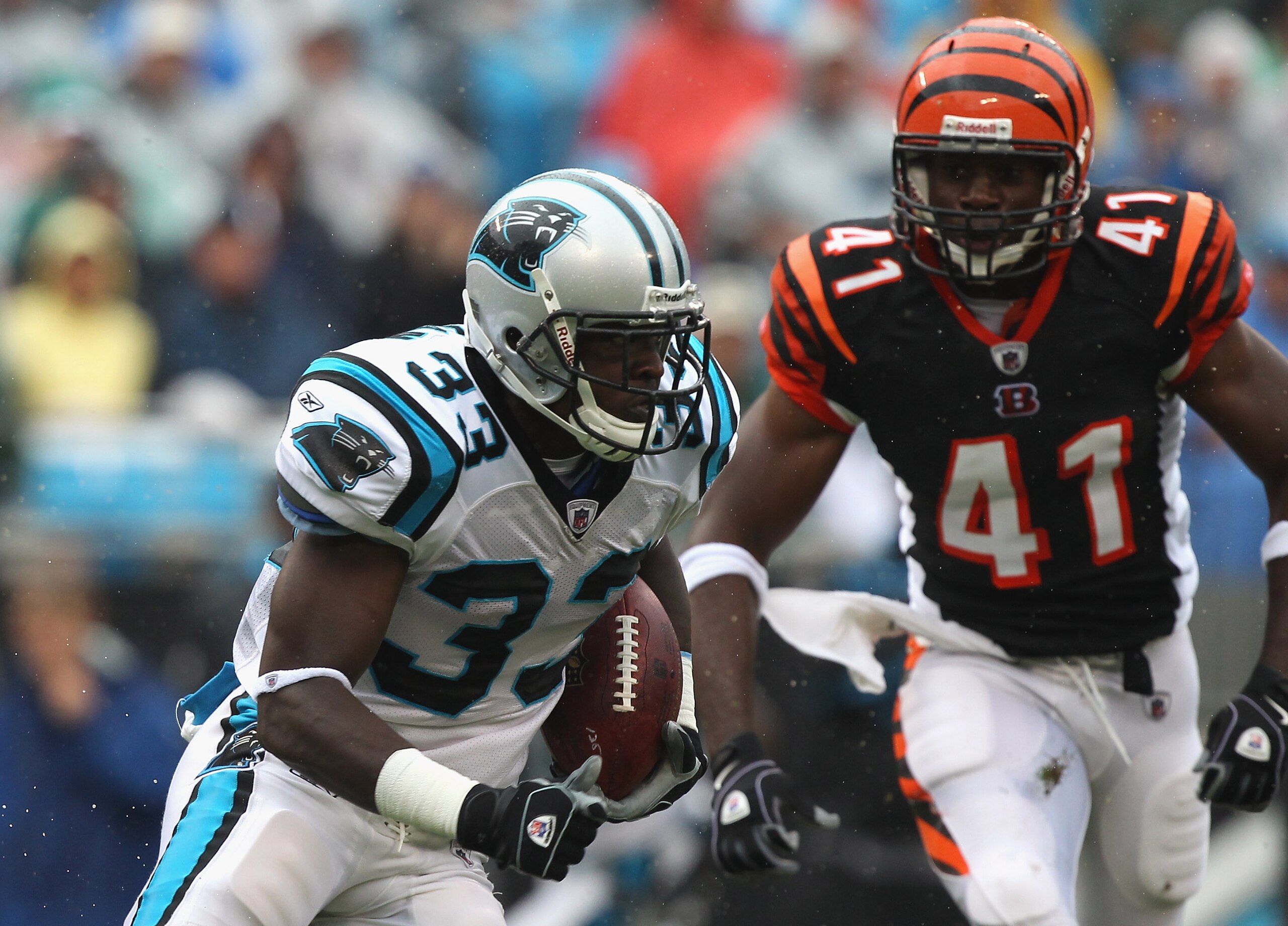 CHARLOTTE, NC - SEPTEMBER 26:  Mike Goodson #33 of the Carolina Panthers runs with the ball against the Cincinnati Bengals during their game at Bank of America Stadium on September 26, 2010 in Charlotte, North Carolina.  (Photo by Streeter Lecka/Getty Ima