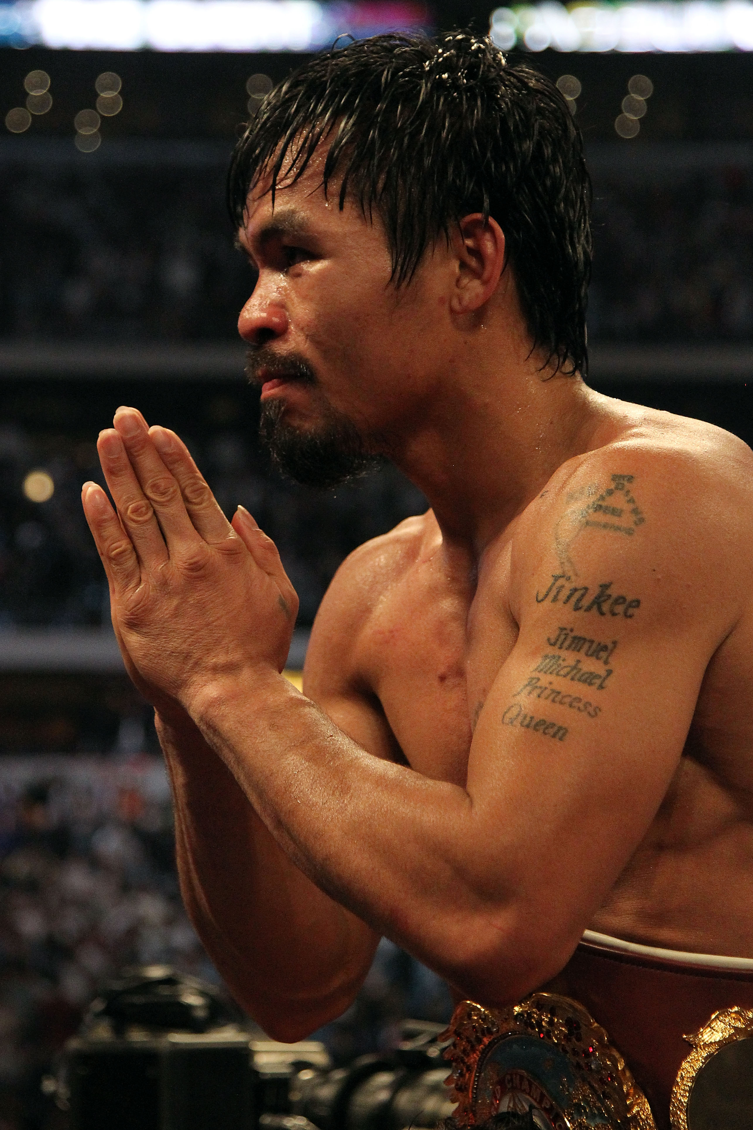 ARLINGTON, TX - MARCH 13:  Manny Pacquiao of the Philippines celebrates in the ring after defeating Joshua Clottey of Ghana during the WBO welterweight title fight at Cowboys Stadium on March 13, 2010 in Arlington, Texas. Pacquiao defeated Clottey by unan