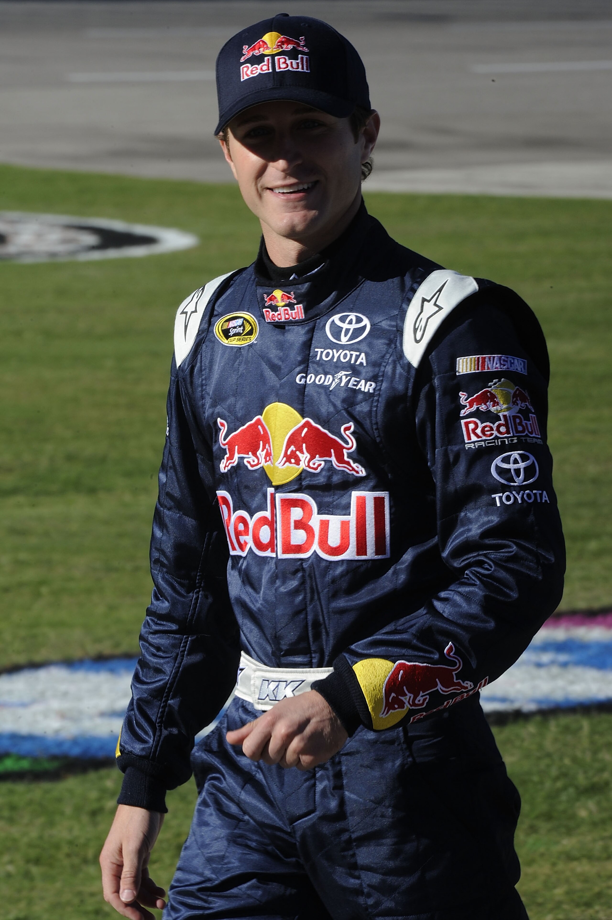 FORT WORTH, TX - NOVEMBER 05:  Kasey Kahne, driver of the #83 Red Bull Toyota, walks on the grid during qualifying for the NASCAR Sprint Cup Series AAA Texas 500 at Texas Motor Speedway on November 5, 2010 in Fort Worth, Texas.  (Photo by John Harrelson/G