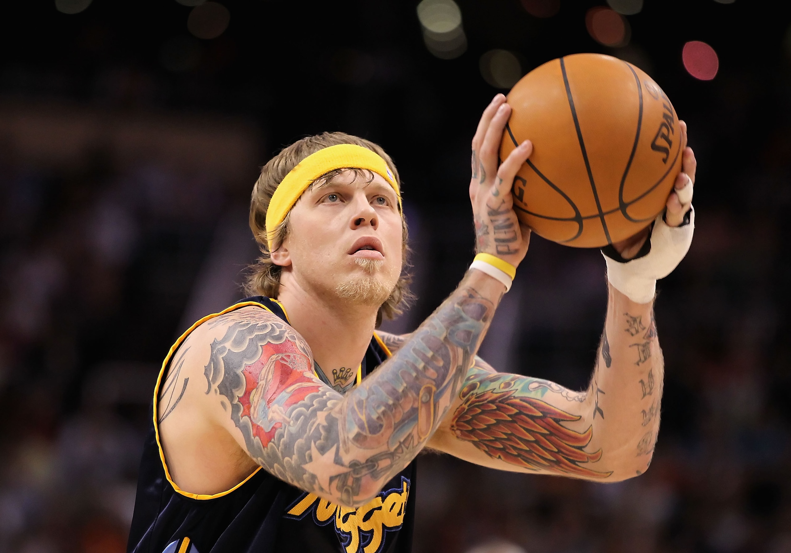 PHOENIX - APRIL 13:  Chris Andersen #11 of the Denver Nuggets shoots a free throw shot against the Phoenix Suns during the NBA game at US Airways Center on April 13, 2010 in Phoenix, Arizona.  The Suns defeated the Nuggets 123-101.  NOTE TO USER: User exp