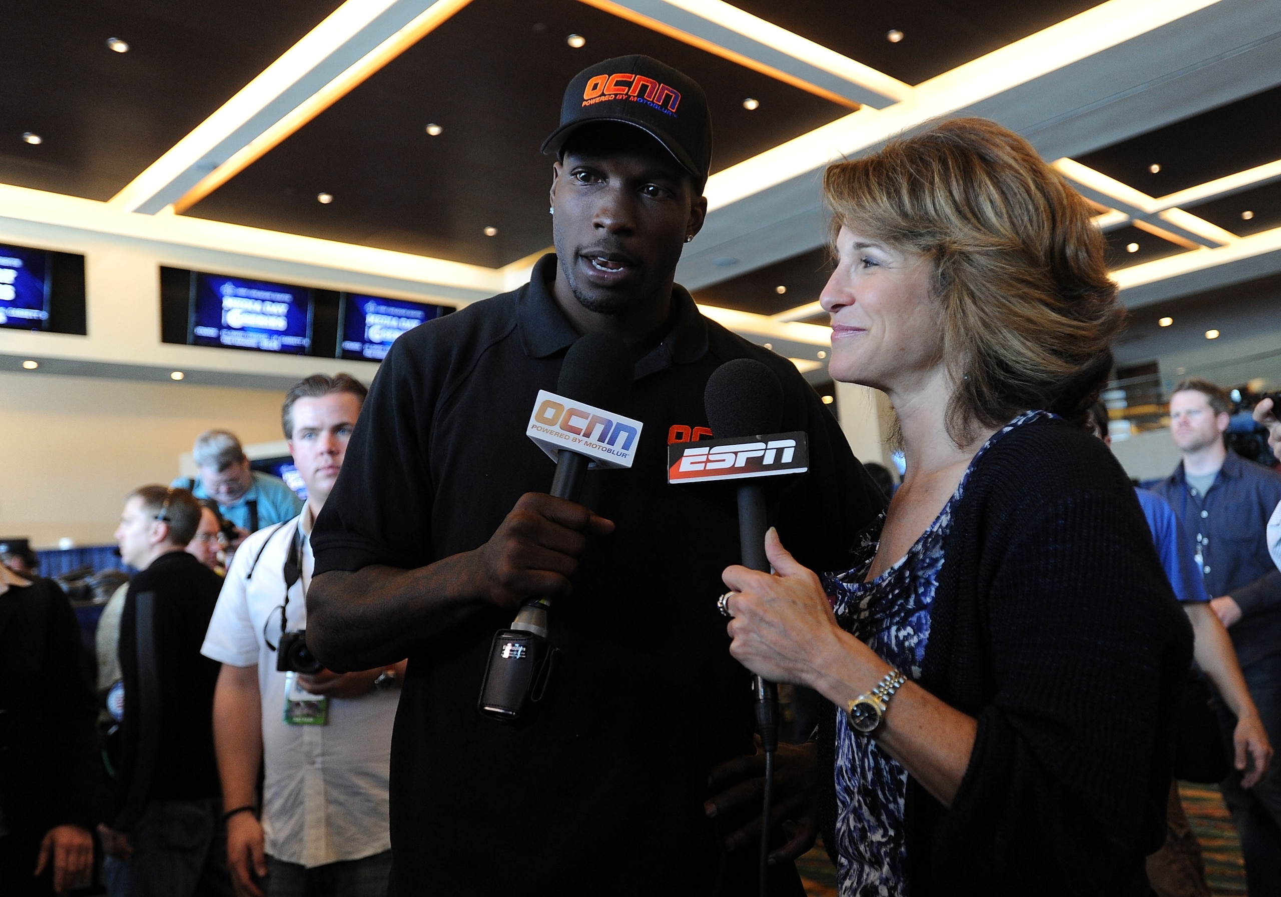 MIAMI GARDENS, FL - FEBRUARY 02:  Chad Ochocinco of the Cincinnati Bengals is interview by Suzy Kolber of ESPN during Super Bowl XLIV Media Day at Sun Life Stadium on February 2, 2010 in Miami Gardens, Florida.  (Photo by Michael Heiman/Getty Images)