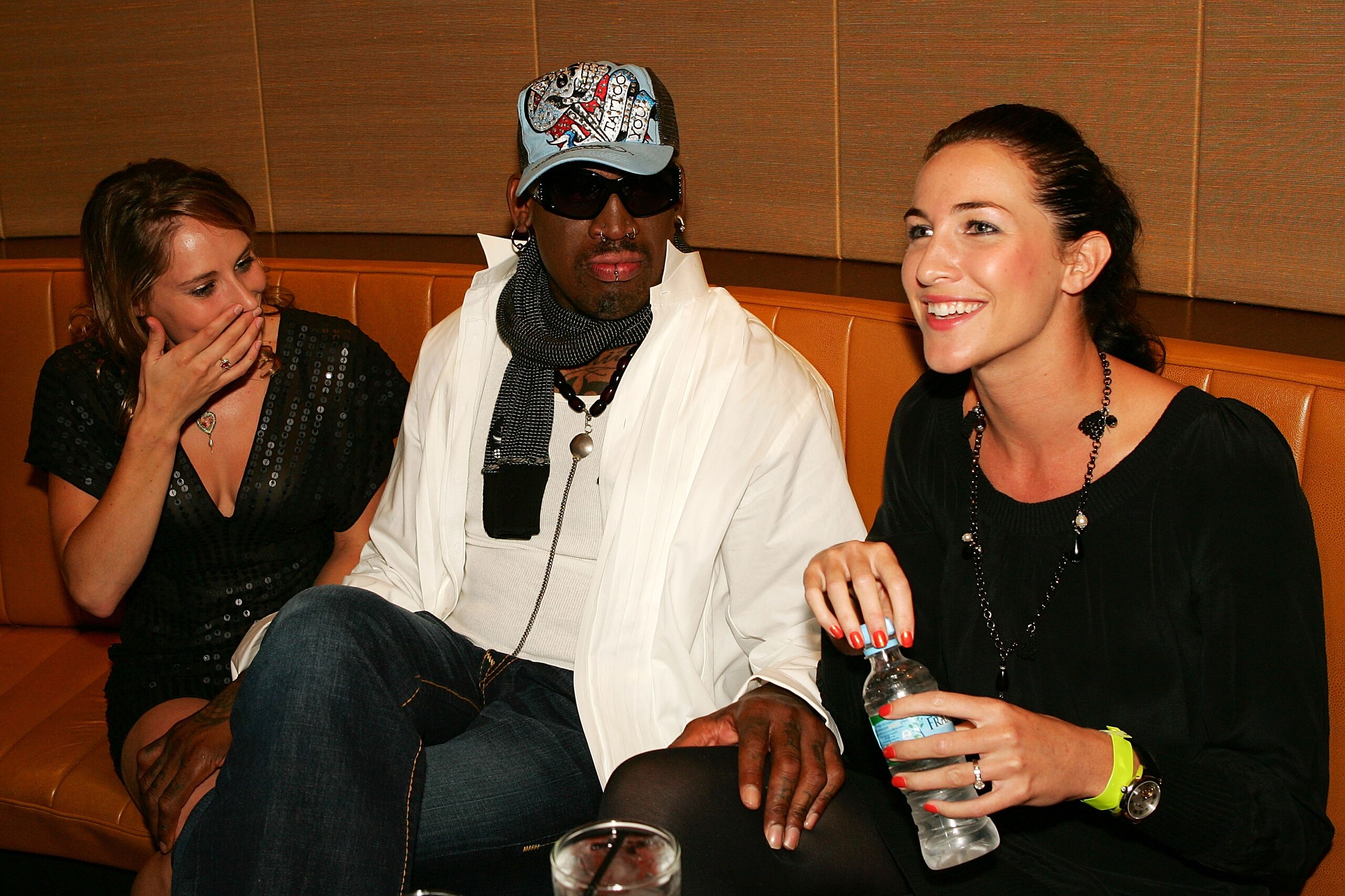 SYDNEY, AUSTRALIA - MARCH 20:  (L-R)Australian gymnast and diver Alexandra Croak, Dennis Rodman and ex-swimmer Elka Graham attend the Battle of the Codes poker game held at Star City March 20, 2008 in Sydney, Australia.  (Photo by Matt King/Getty Images)