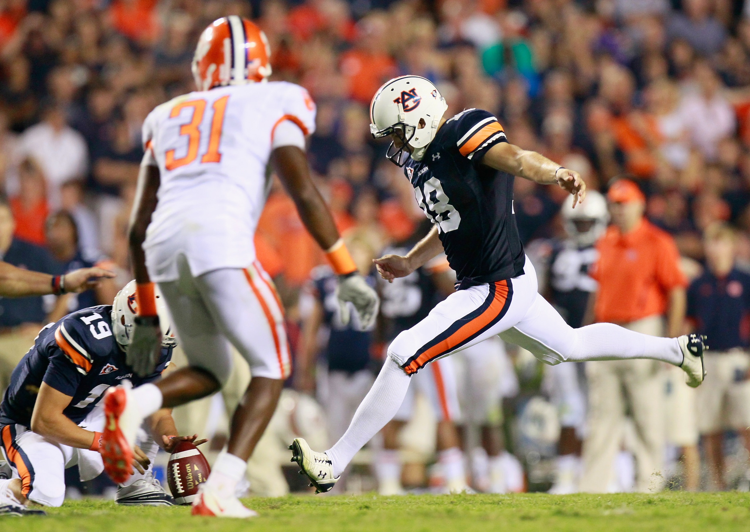 AUBURN, AL - SEPTEMBER 18: Kicker Wes Byrum #18 of the Auburn Tigers kicks the go-ahead field goal in overtime against the Clemson Tigers at Jordan-Hare Stadium on September 18, 2010 in Auburn, Alabama. (Photo by Kevin C. Cox/Getty Images) AUBURN, AL - SEPTEMBER 18: Kicker Wes Byrum #18 of the Auburn Tigers kicks the go-ahead field goal in overtime against the Clemson Tigers at Jordan-Hare Stadium on September 18, 2010 in Auburn, Alabama. (Photo by Kevin C. Cox/Getty Images)