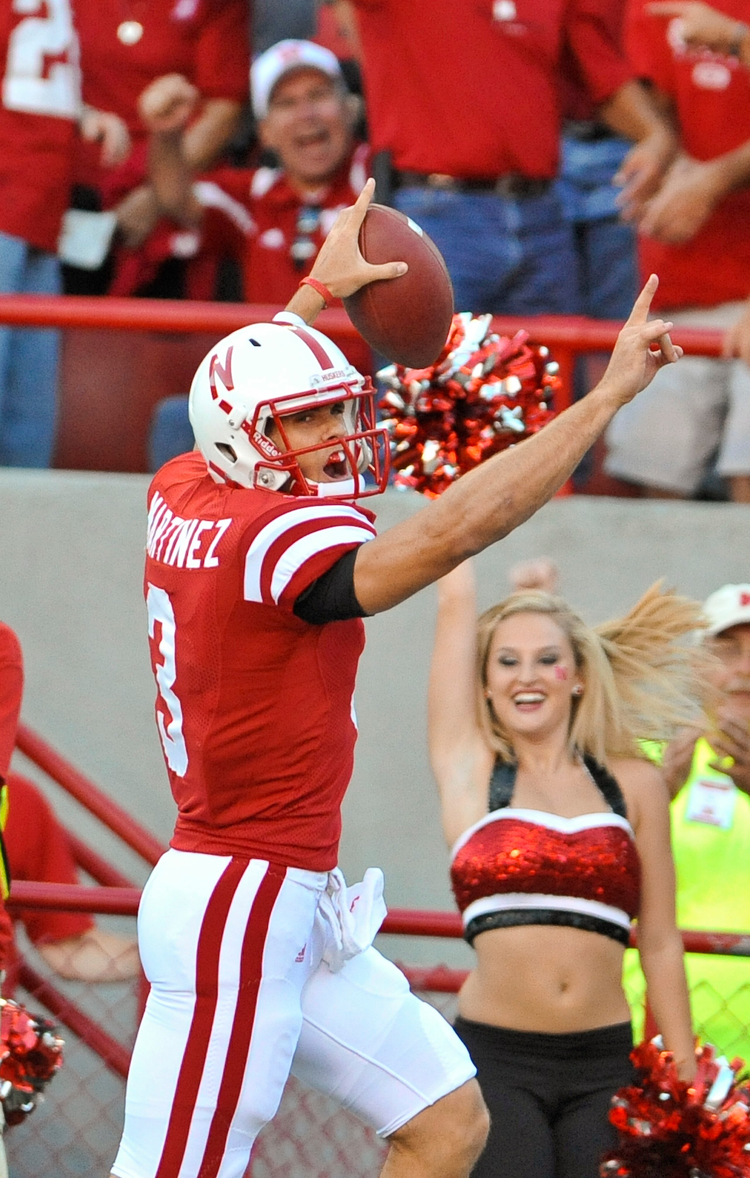 LINCOLN, NE - SEPTEMBER 04: Taylor Matinez #3 of the Nebraska Cornhuskers scores his first touchdown as a Cornhusker during the first half of their game against the Western Kentucky Hilltoppers at Memorial Stadium on September 4, 2010 in Lincoln, Nebra LINCOLN, NE - SEPTEMBER 04: Taylor Matinez #3 of the Nebraska Cornhuskers scores his first touchdown as a Cornhusker during the first half of their game against the Western Kentucky Hilltoppers at Memorial Stadium on September 4, 2010 in Lincoln, Nebra
