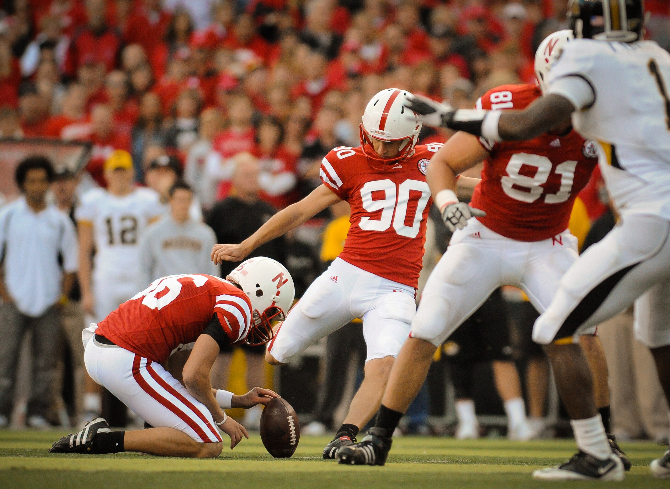 LINCOLN, NE - OCTOBER 30: Kicker Alex Henery #90 of the Nebraska Cornhuskers kicks an extra point during second half action of their game at Memorial Stadium on October 30, 2010 in Lincoln, Nebraska. Nebraska Defeated Missouri 31-17. (Photo by Eric Franci LINCOLN, NE - OCTOBER 30: Kicker Alex Henery #90 of the Nebraska Cornhuskers kicks an extra point during second half action of their game at Memorial Stadium on October 30, 2010 in Lincoln, Nebraska. Nebraska Defeated Missouri 31-17. (Photo by Eric Franci