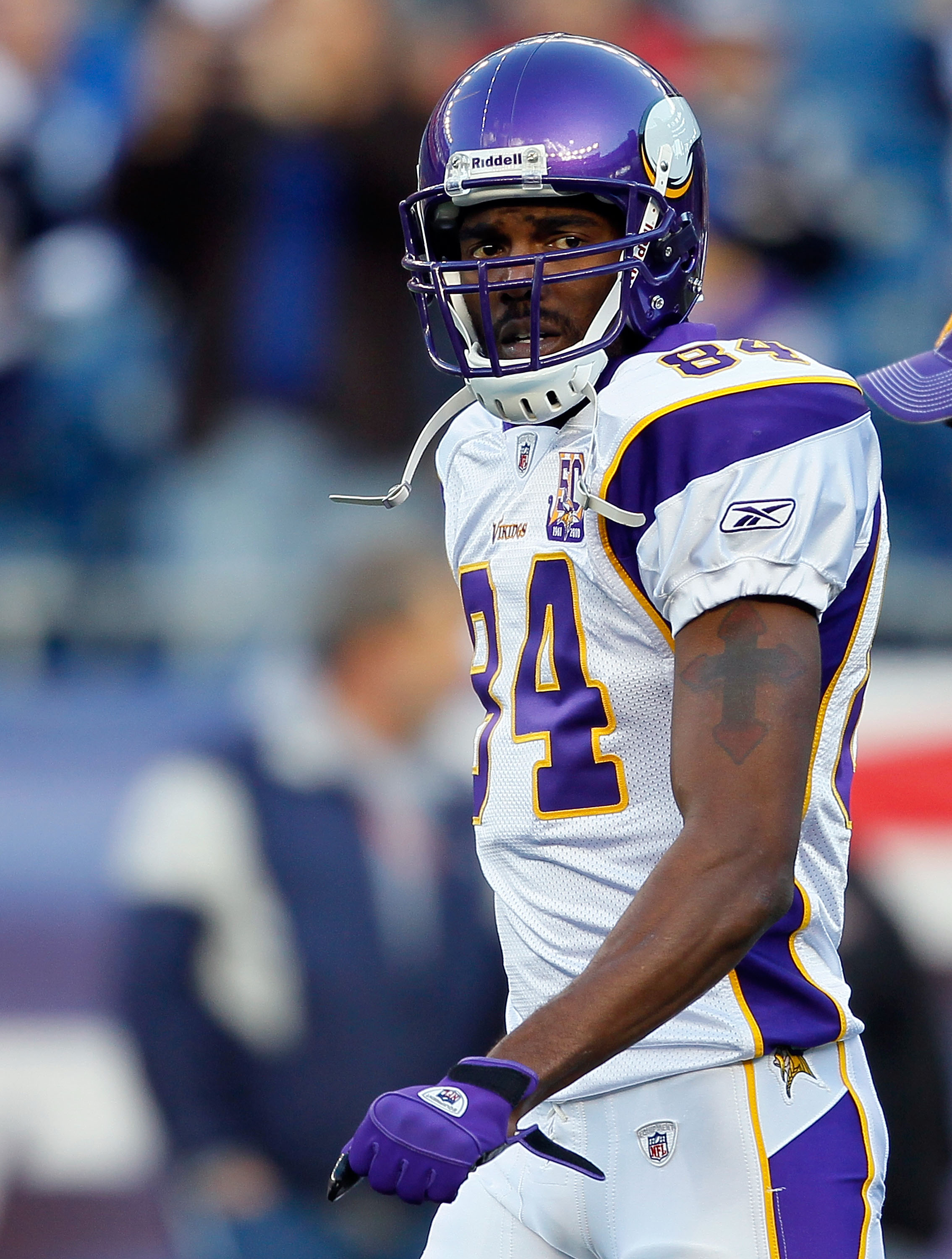 FOXBORO, MA - OCTOBER 31:  Randy Moss #84 of the Minnesota Vikings runs onto the field before a game against the New England Patriots at Gillette Stadium on October 31, 2010 in Foxboro, Massachusetts. (Photo by Jim Rogash/Getty Images)