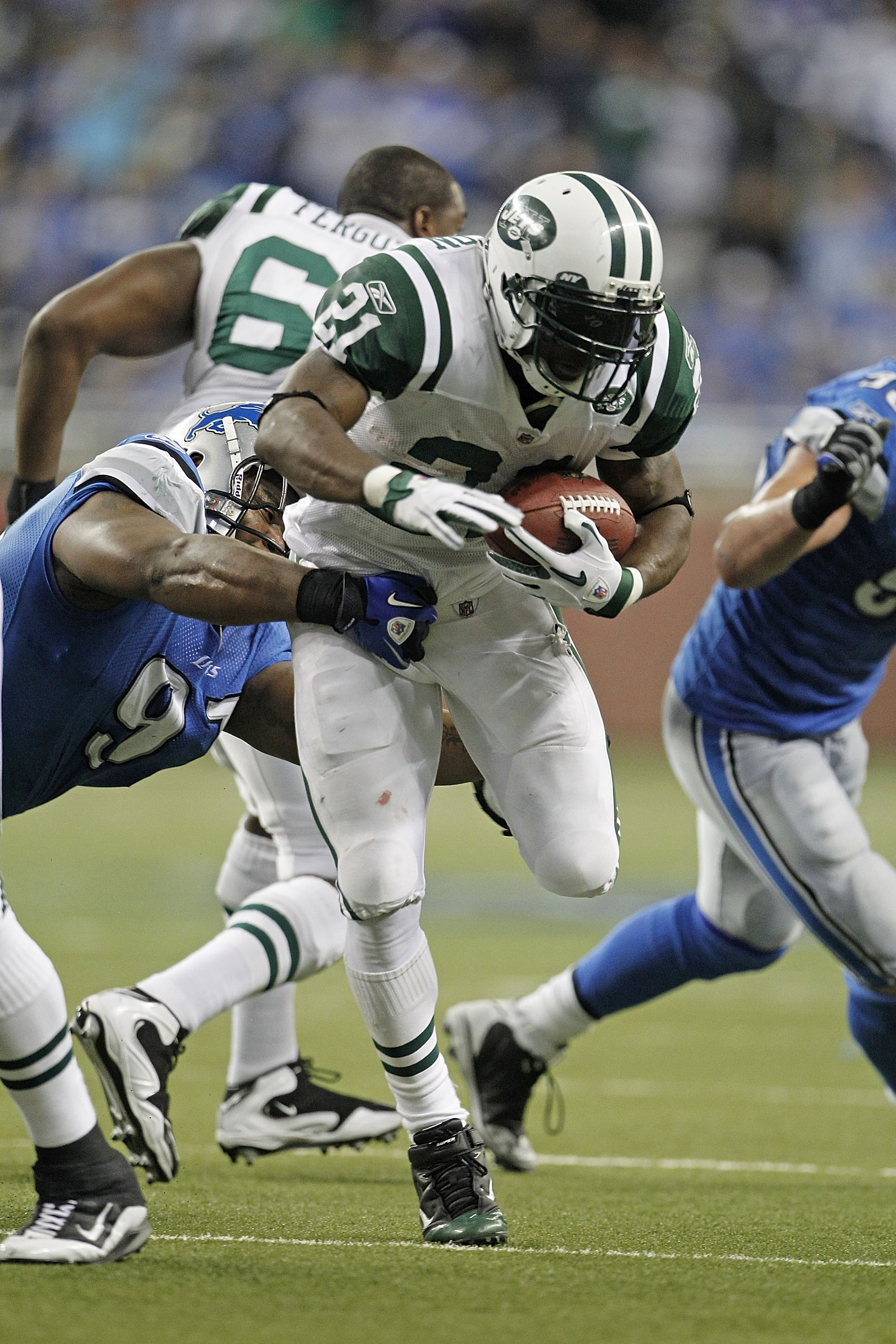DETROIT - NOVEMBER 07:  LaDainian Tomlinson #21 of the New York Jets runs for a short gain during the third quarter of the game against the Detroit Lions at Ford Field on November 7, 2010 in Detroit, Michigan. The Jets defeated the Lions 23-20 in overtime