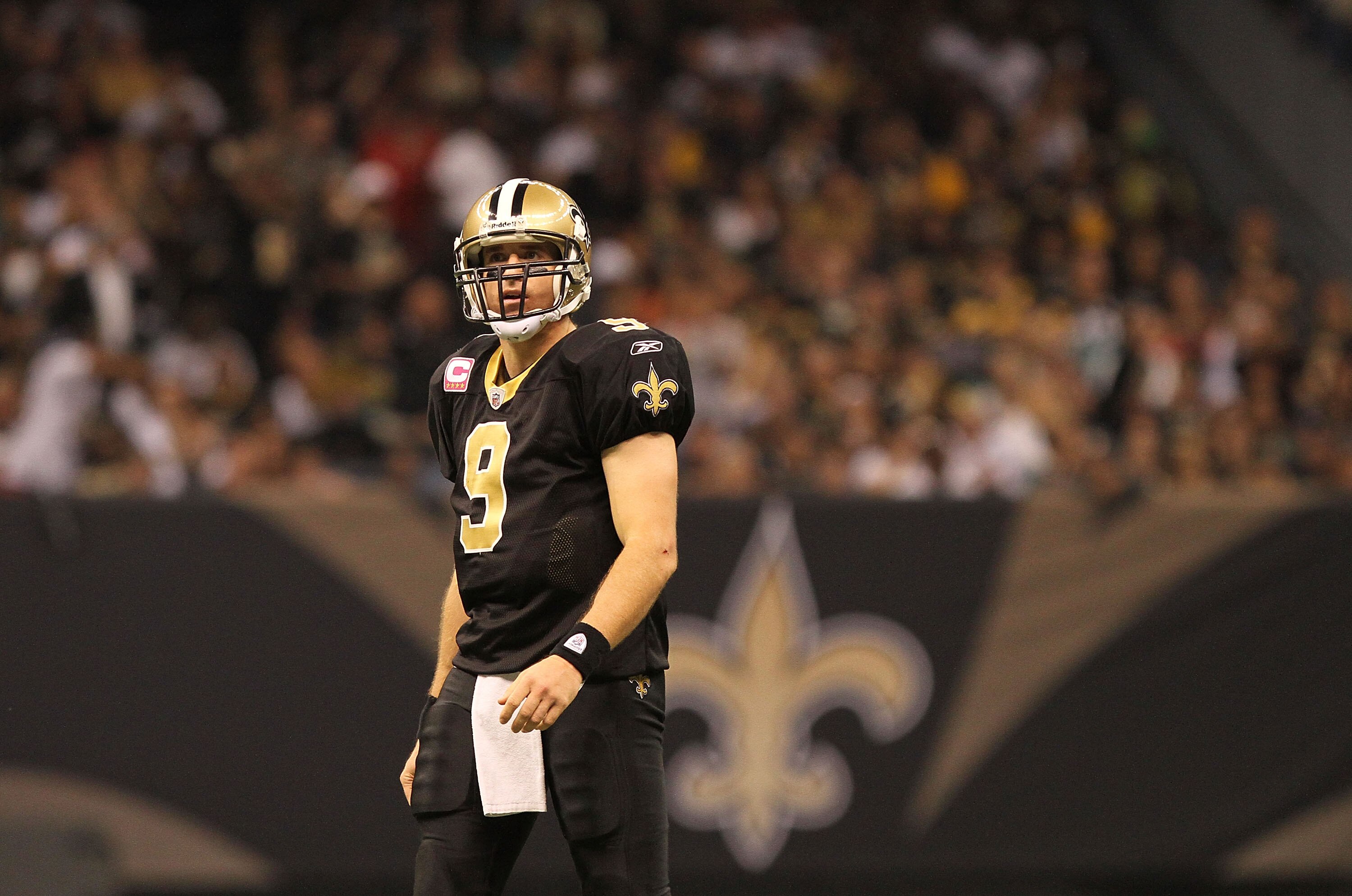NEW ORLEANS, LA - OCTOBER 31: Drew Brees #9 of the New Orleans Saints looks on during the game against the Pittsburgh Steelers at the Louisiana Superdome on October 31, 2010 in New Orleans, Louisiana. (Photo by Matthew Sharpe/Getty Images)