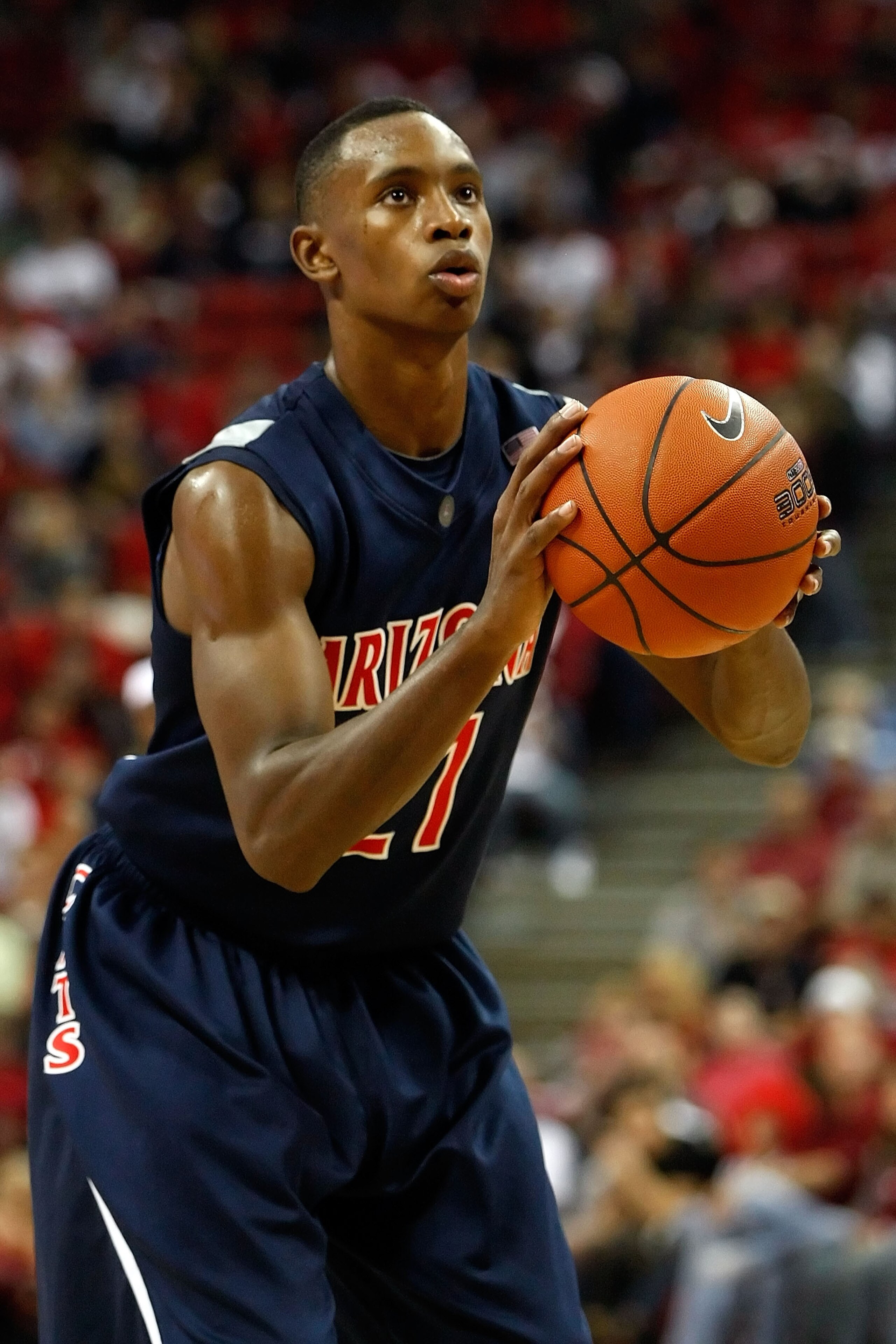LAS VEGAS - DECEMBER 20:  Kyle Fogg #21 of the Arizona Wildcats shoots a free throw against the UNLV Rebels at the Thomas & Mack Center December 20, 2008 in Las Vegas, Nevada.  (Photo by Ethan Miller/Getty Images)
