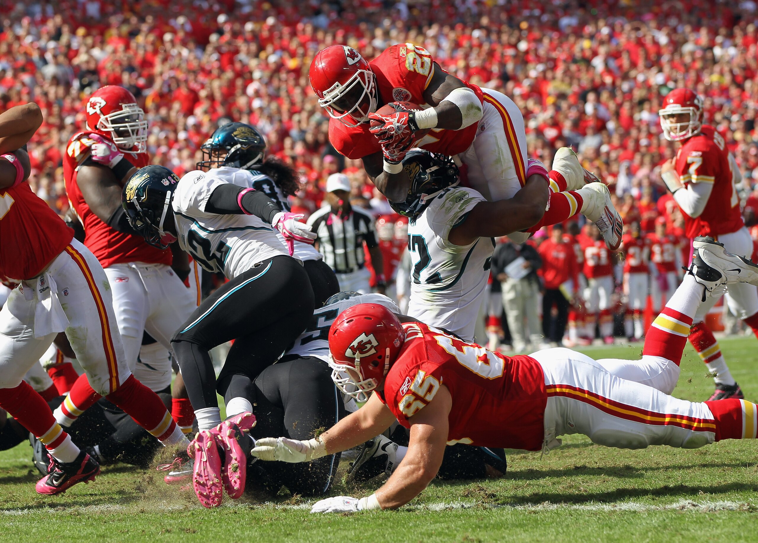 KANSAS CITY, MO - OCTOBER 24:  Running back Thomas Jones #20 of the Kansas City Chiefs carries the ball up and over while trying to score during the game against the Jacksonville Jaguars on October 24, 2010 at Arrowhead Stadium in Kansas City, Missouri.  