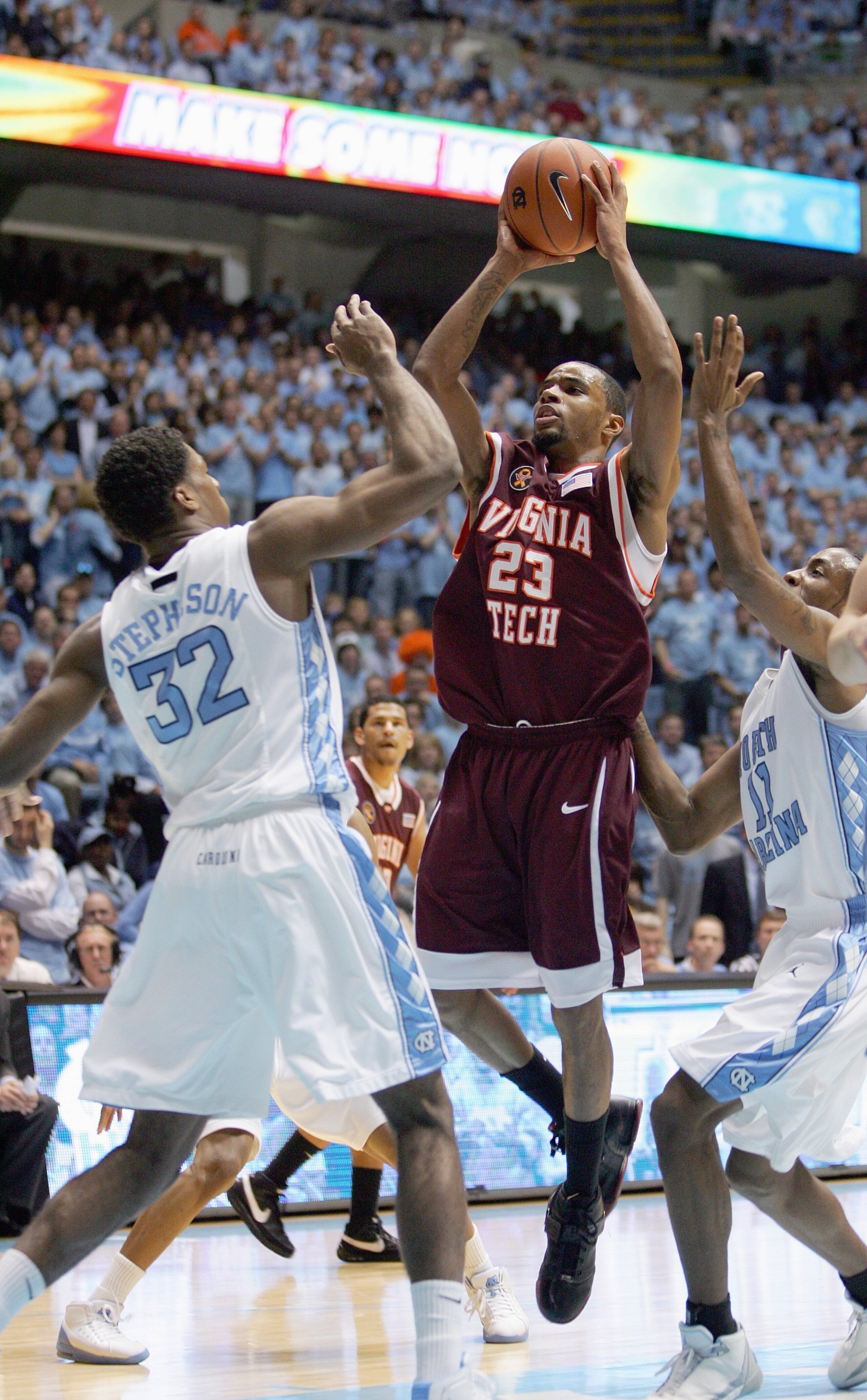 CHAPEL HILL - FEBRUARY 16: Malcolm Delaney #23 of the Virginia Tech Hokies takes a shot against Alex Stepheson #32 of the North Carolina Tar Heels at the Dean E. Smith Center on February 16, 2008 in Chapel Hill, North Carolina. (Photo by: Streeter Lecka/G CHAPEL HILL - FEBRUARY 16: Malcolm Delaney #23 of the Virginia Tech Hokies takes a shot against Alex Stepheson #32 of the North Carolina Tar Heels at the Dean E. Smith Center on February 16, 2008 in Chapel Hill, North Carolina. (Photo by: Streeter Lecka/G