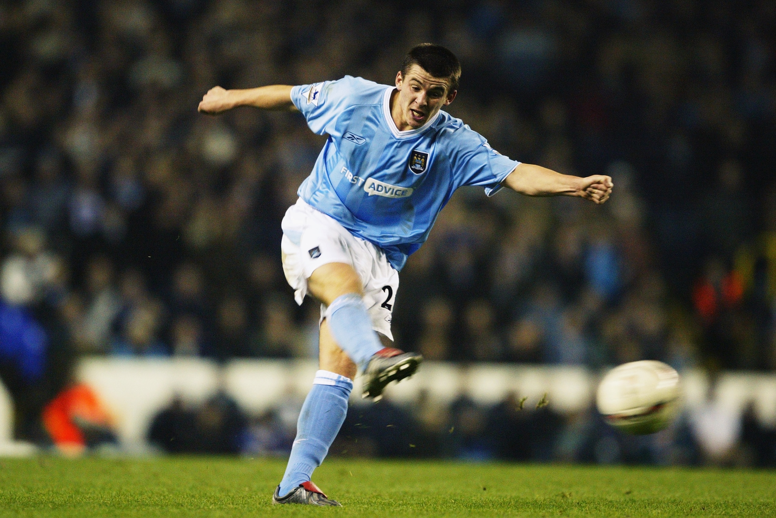 LONDON - DECEMBER 3:  Joey Barton of Manchester City strikes the ball during the Carling Cup fourth round match between Tottenham Hotspur and Manchester City at White Hart Lane on December 3, 2003 in London.  Tottenham Hotspur won the match 3-1.  (Photo b