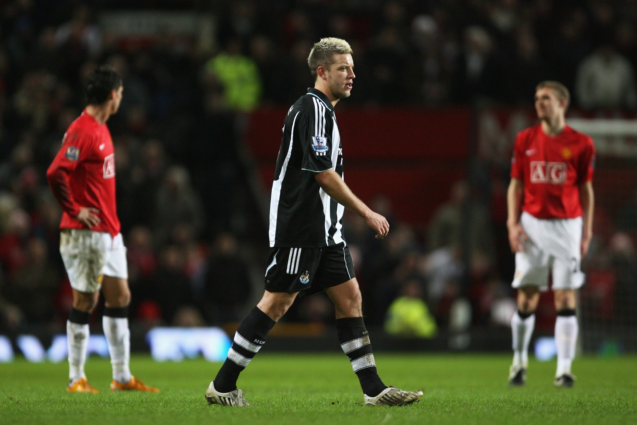 MANCHESTER, UNITED KINGDOM - JANUARY 12:  Alan Smith of Newcastle leaves the pitch after being shown the red card by Referee Rob Styles during the Barclays Premier League match between Manchester United and Newcastle United at Old Trafford on January 12,