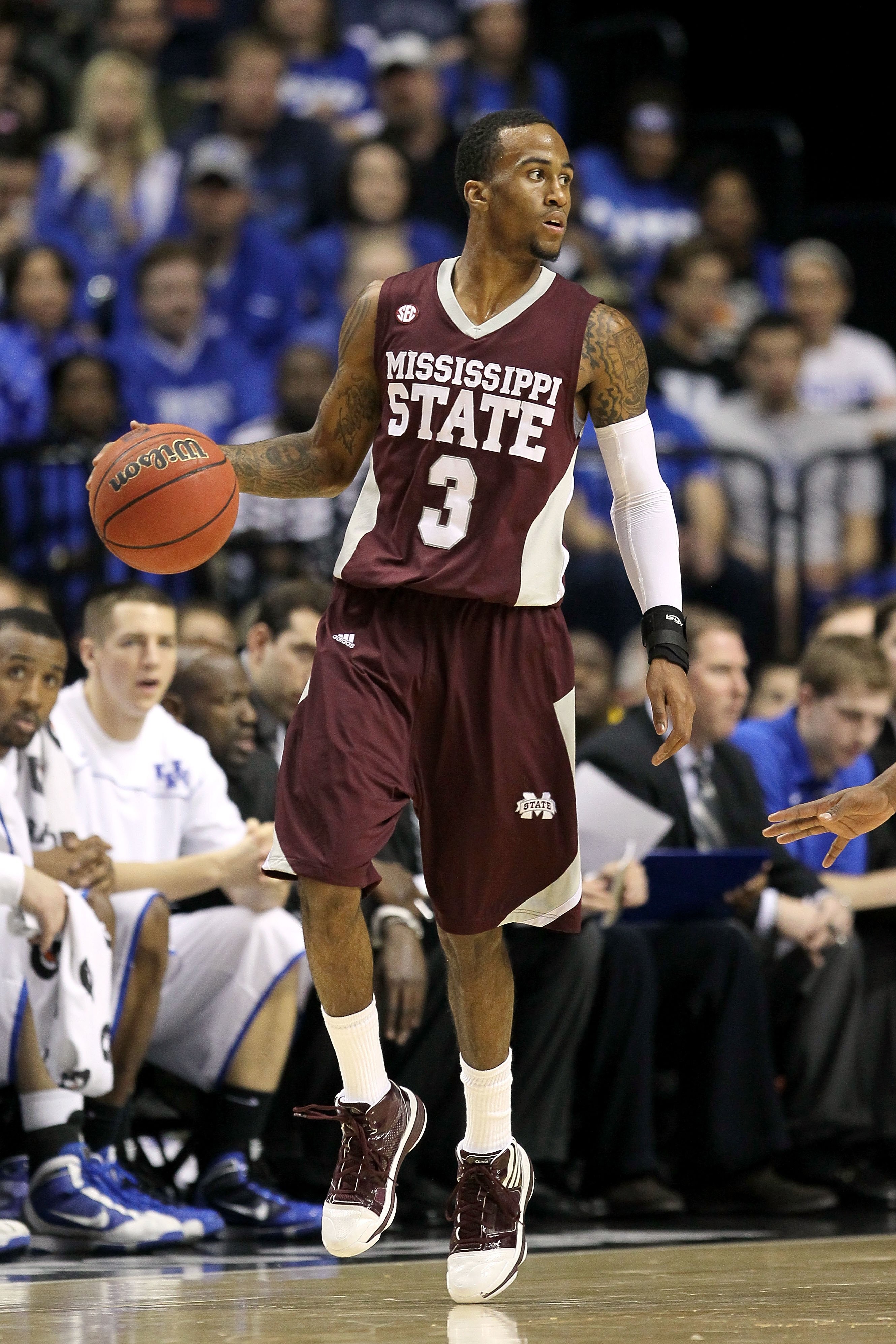 NASHVILLE, TN - MARCH 14:  Dee Bost #3 of the Mississippi State Bulldogs looks to pass the ball against the Kentucky Wildcats during the final of the SEC Men's Basketball Tournament at the Bridgestone Arena on March 14, 2010 in Nashville, Tennessee. Kentu