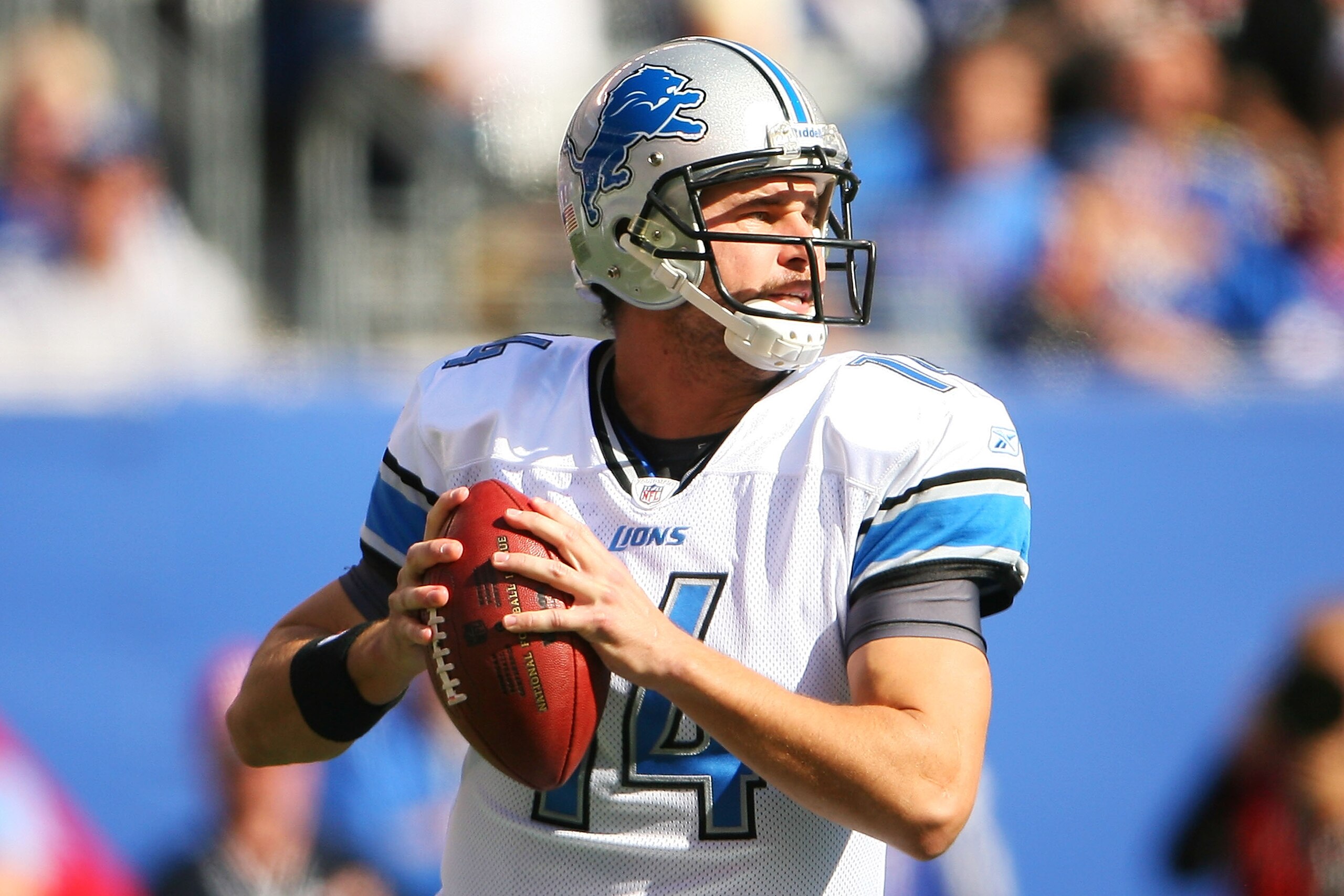 EAST RUTHERFORD, NJ - OCTOBER 17:  Shaun Hill #14 of the Detroit Lions drops back to pass against the New York Giants at New Meadowlands Stadium on October 17, 2010 in East Rutherford, New Jersey.  (Photo by Andrew Burton/Getty Images)