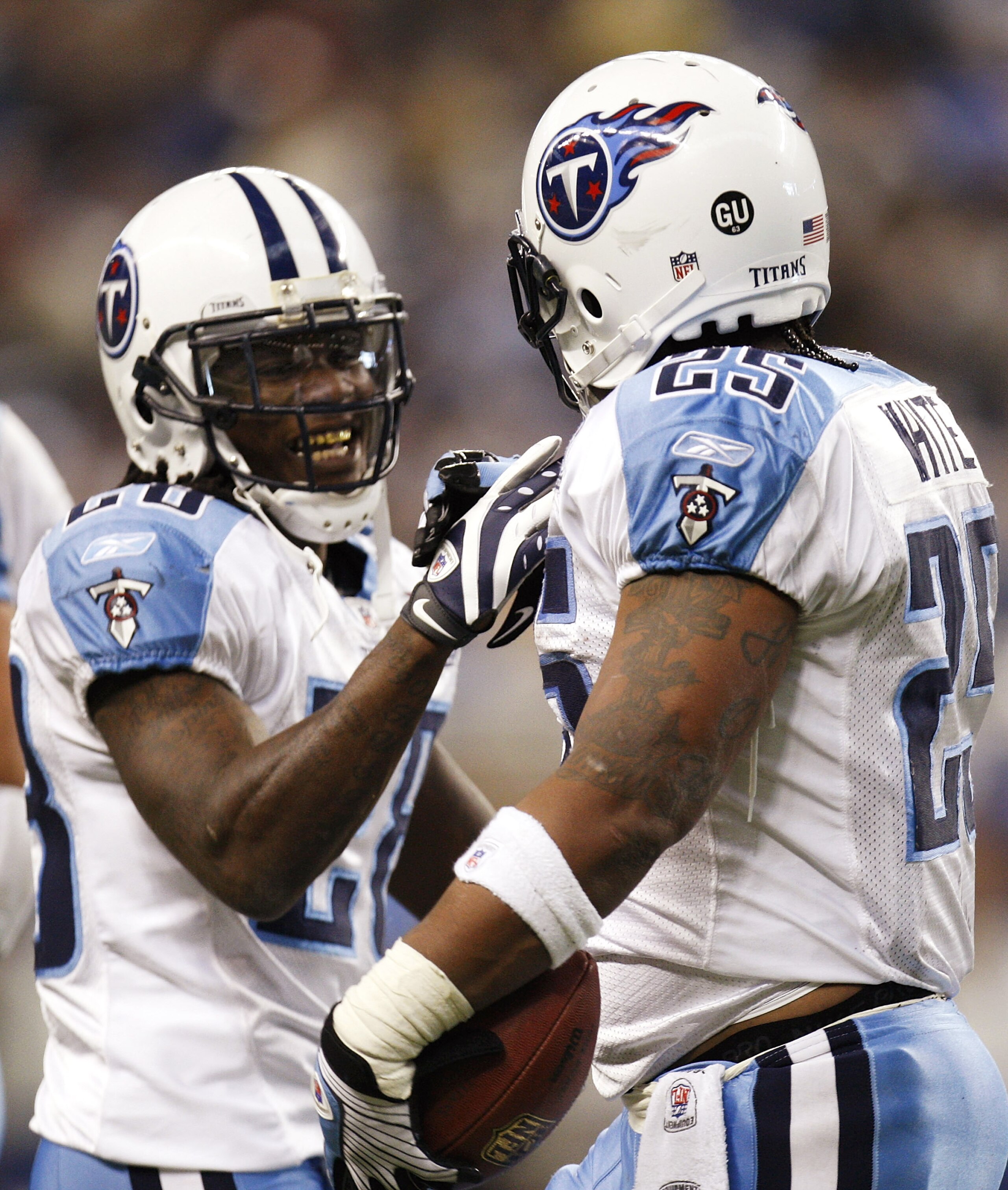 DETROIT , MI - NOVEMBER 27:  LenDale White #25 of the Tennessee Titans celebrates a second quarter touchdown with Chris Johnson #28 while playing the Detroit Lions on November 27, 2008 at Ford Field in Detroit, Michigan.  (Photo by Gregory Shamus/Getty Im