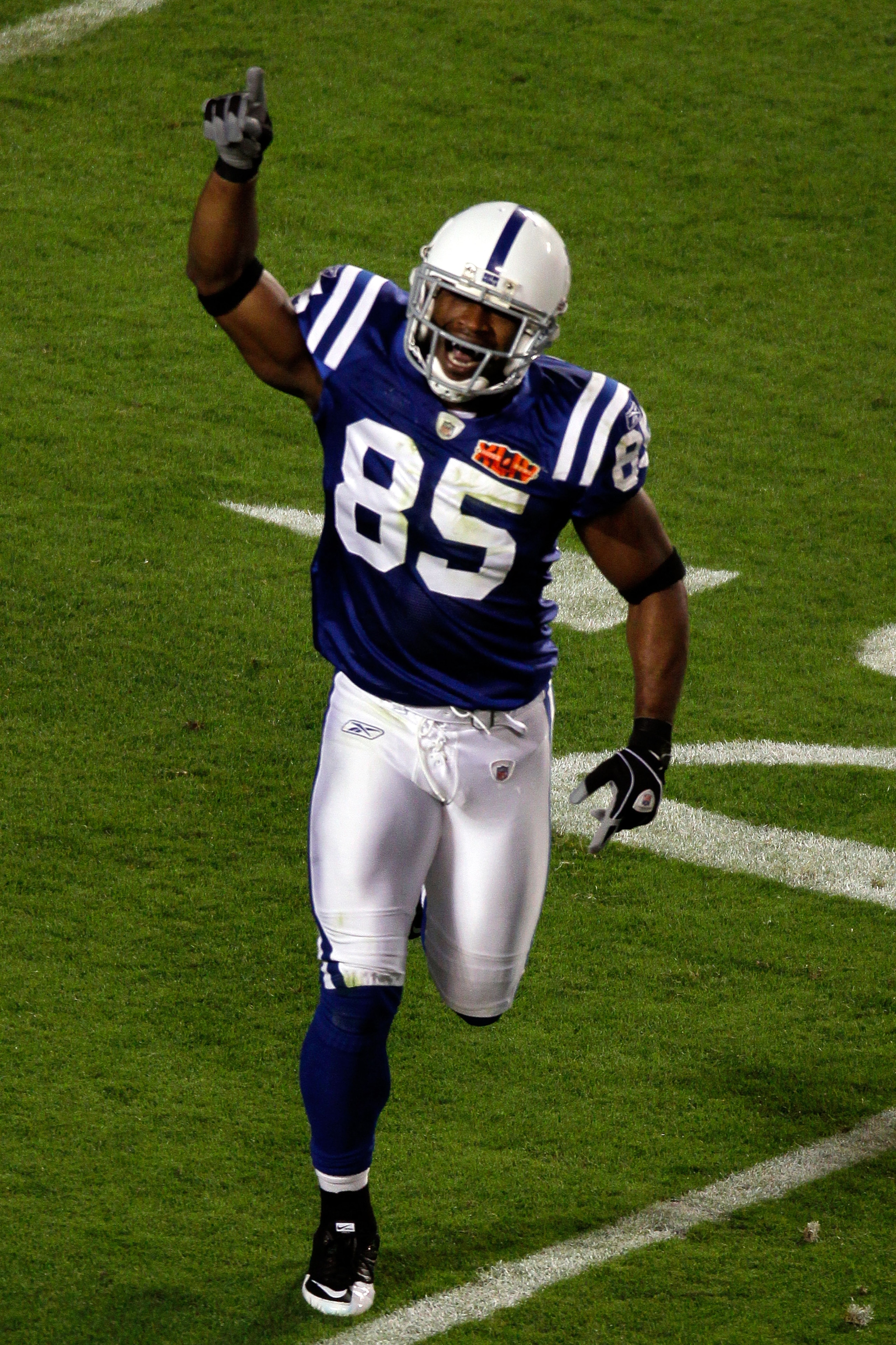 MIAMI GARDENS, FL - FEBRUARY 07:  Pierre Garcon #85 of the Indianapolis Colts runs off the field after making a catch for a touchdown against the New Orleans Saints during the first quarter Super Bowl XLIV on February 7, 2010 at Sun Life Stadium in Miami