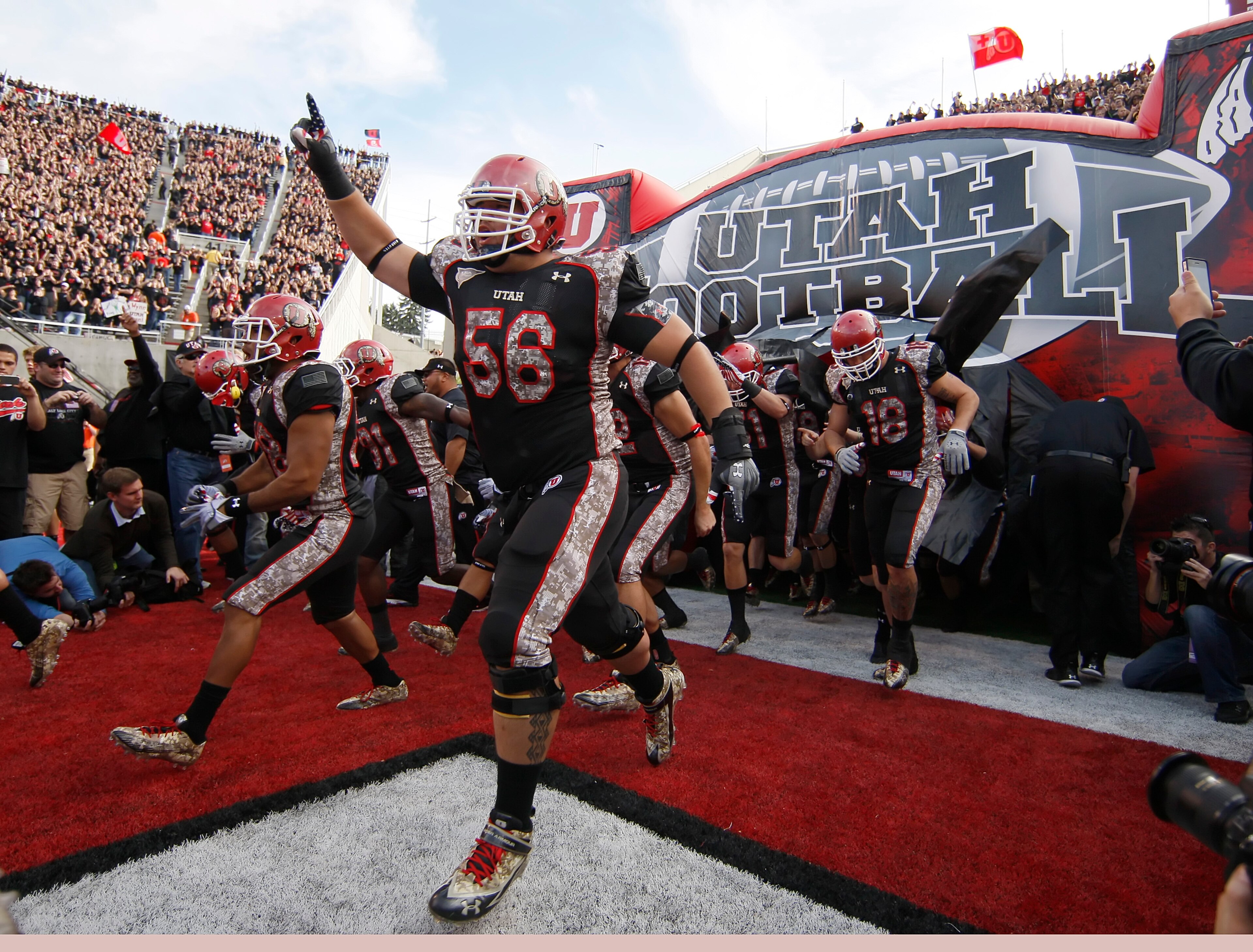 SALT LAKE CITY, UT - NOVEMBER 6: Kapua Sai #56 of the Utah Utes enters the field before a game against the TCU Horned Frogs during the first half of an NCAA Football game November 6, 2010 at Rice-Eccles Stadium in Salt Lake City, Utah. TCU Beat Utah 47-7. SALT LAKE CITY, UT - NOVEMBER 6: Kapua Sai #56 of the Utah Utes enters the field before a game against the TCU Horned Frogs during the first half of an NCAA Football game November 6, 2010 at Rice-Eccles Stadium in Salt Lake City, Utah. TCU Beat Utah 47-7.