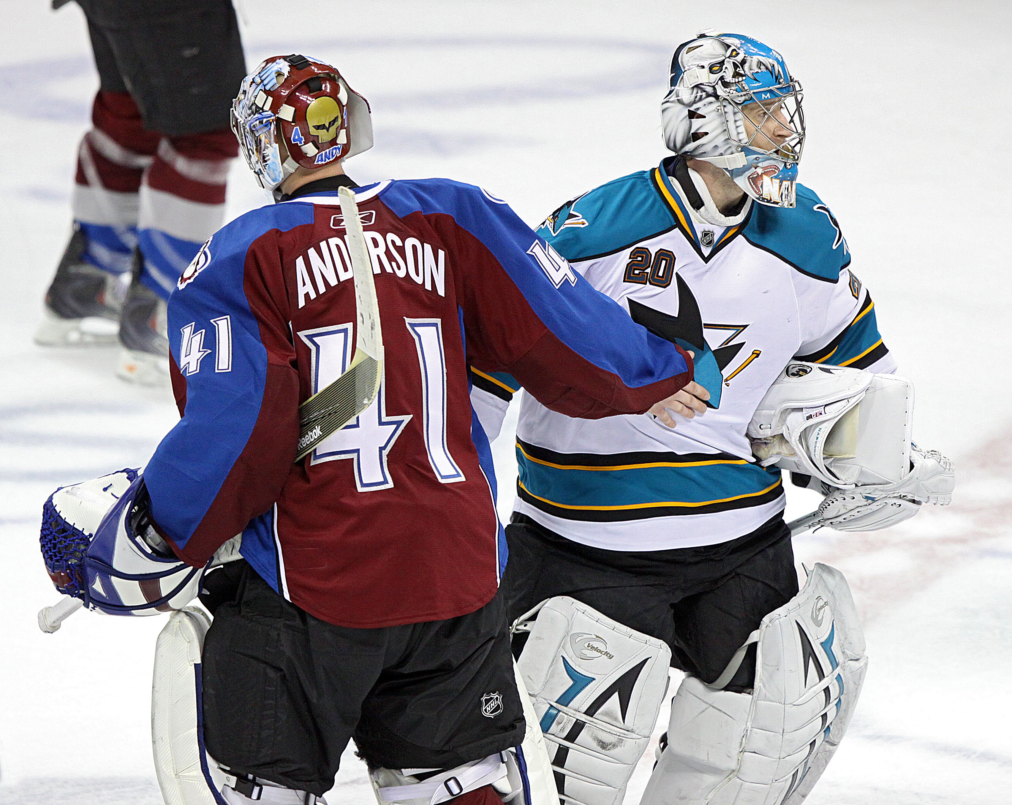 DENVER, CO - APRIL 24 : Goaltender Craig Anderson #41 of the Colorado Avalanche shakes hands with fellow goaltender Evgeni Nabokov #20 of the San Jose Sharks after Game Six of the Western Conference Quarterfinals during the 2010 NHL Stanley Cup Playoffs a