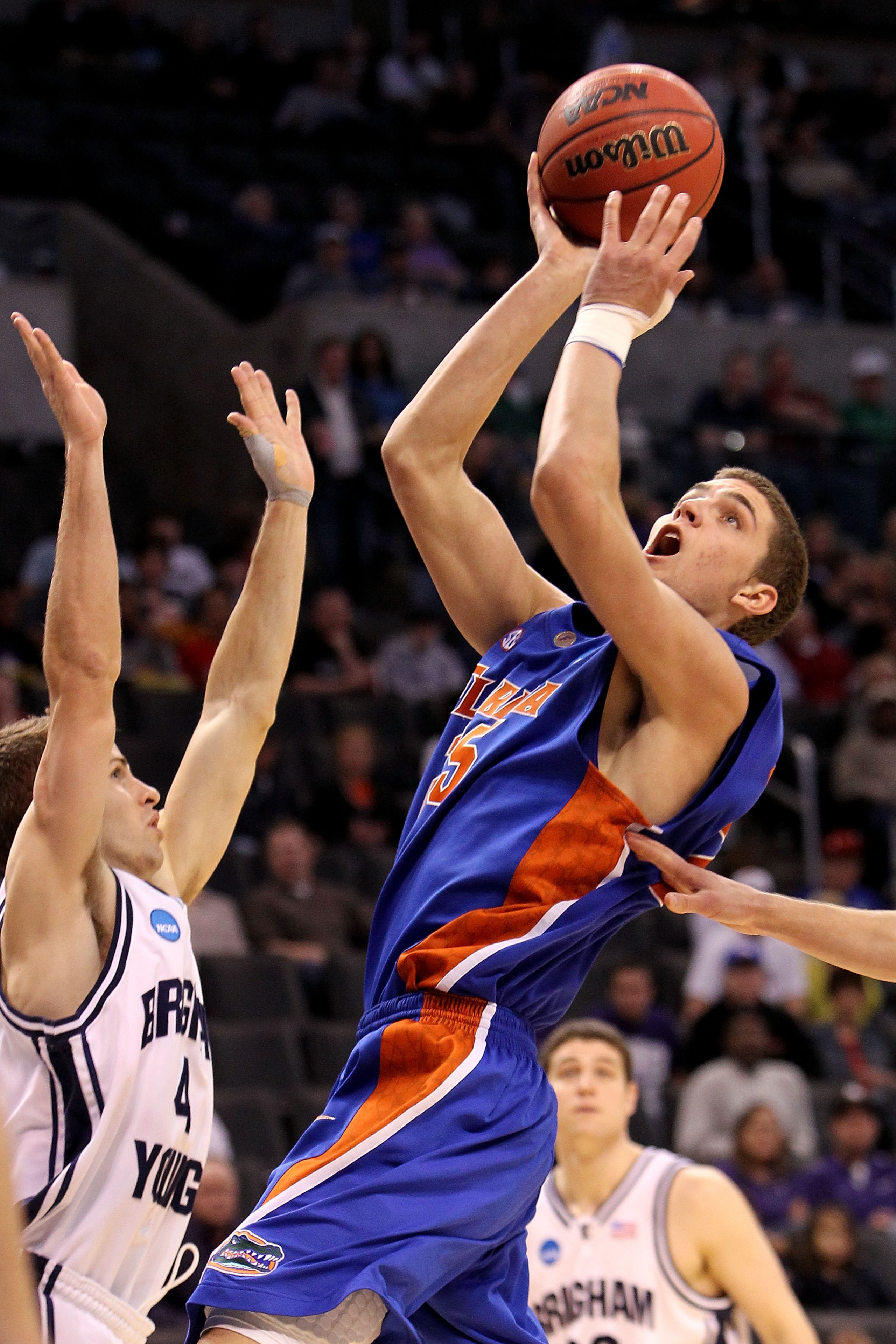 OKLAHOMA CITY - MARCH 18: Chandler Parsons #25 of the Florida Gators attempts a shot against Jackson Emery #4 of the BYU Cougars during the first round of the 2010 NCAA menรฏยฟยฝs basketball tournament at Ford Center on March 18, 2010 in Oklahoma City, Oklaho OKLAHOMA CITY - MARCH 18: Chandler Parsons #25 of the Florida Gators attempts a shot against Jackson Emery #4 of the BYU Cougars during the first round of the 2010 NCAA menรฏยฟยฝs basketball tournament at Ford Center on March 18, 2010 in Oklahoma City, Oklaho