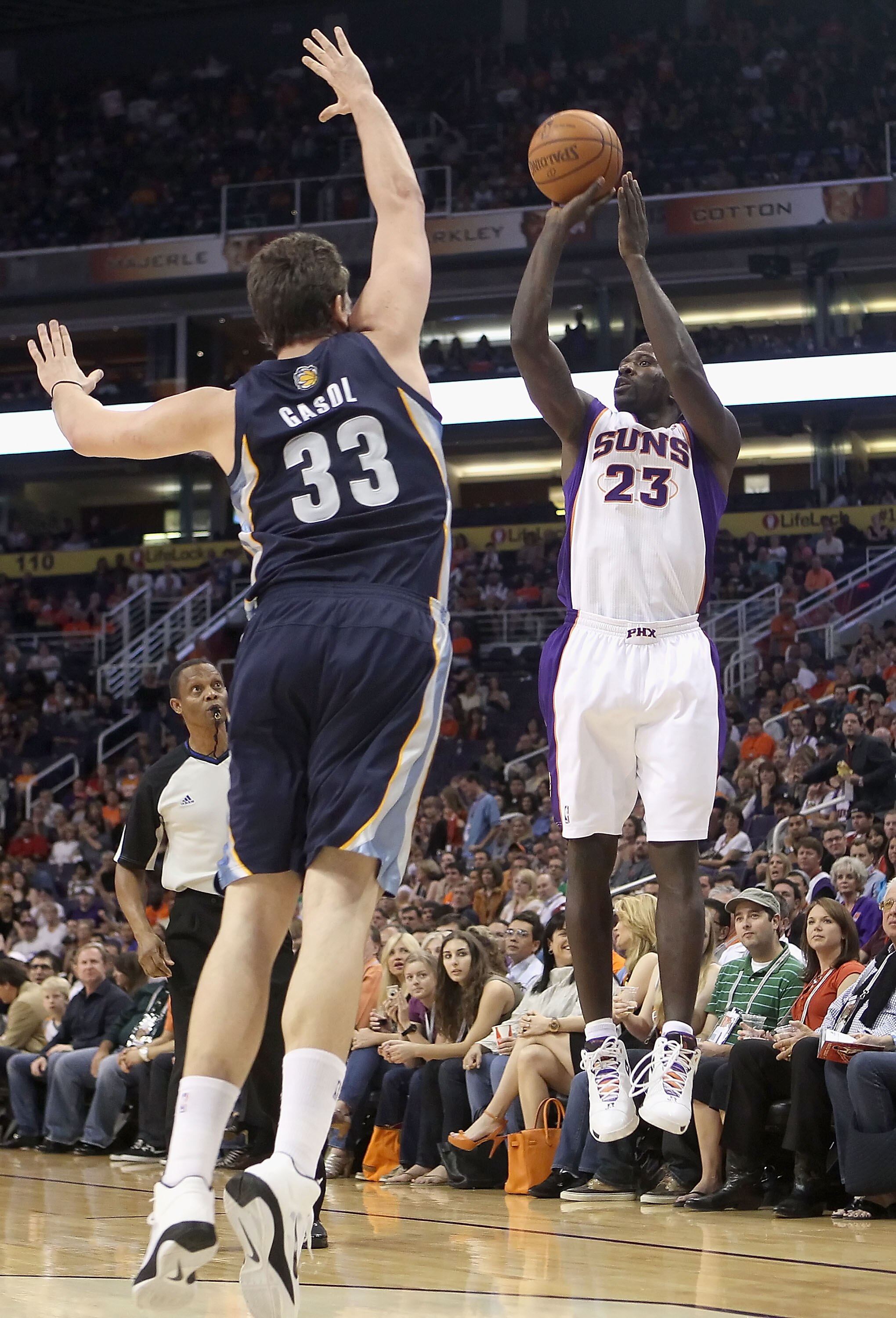 PHOENIX - NOVEMBER 05:  Jason Richardson #23 of the Phoenix Suns puts up a three point shot over Marc Gasol #33 of the Memphis Grizzlies during the NBA game at US Airways Center on November 5, 2010 in Phoenix, Arizona. NOTE TO USER: User expressly acknowl