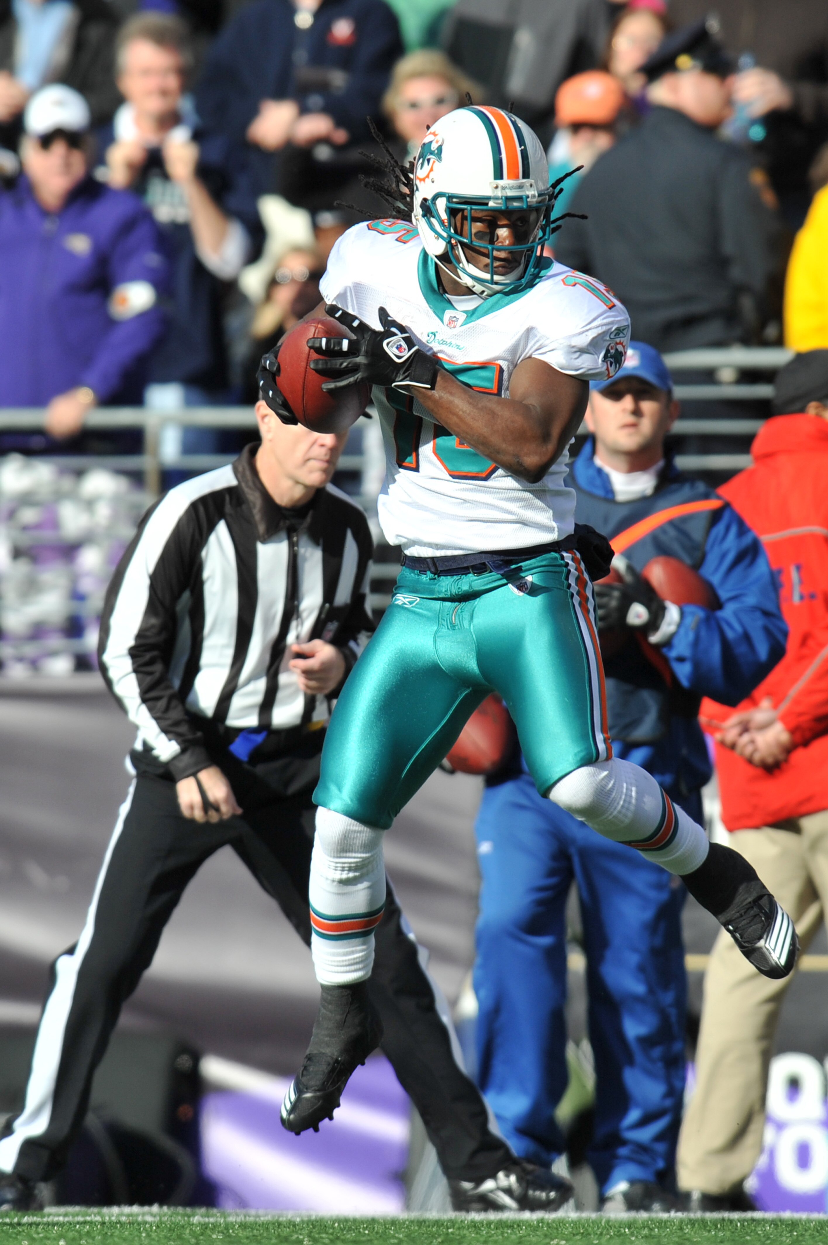 BALTIMORE, MD - NOVEMBER 7:  Davone Bess #15 of the Miami Dolphins makes a catch against the Baltimore Ravens at M&T Bank Stadium on November 7, 2010 in Baltimore, Maryland. The Ravens defeated the Dolphins 26-10. (Photo by Larry French/Getty Images)