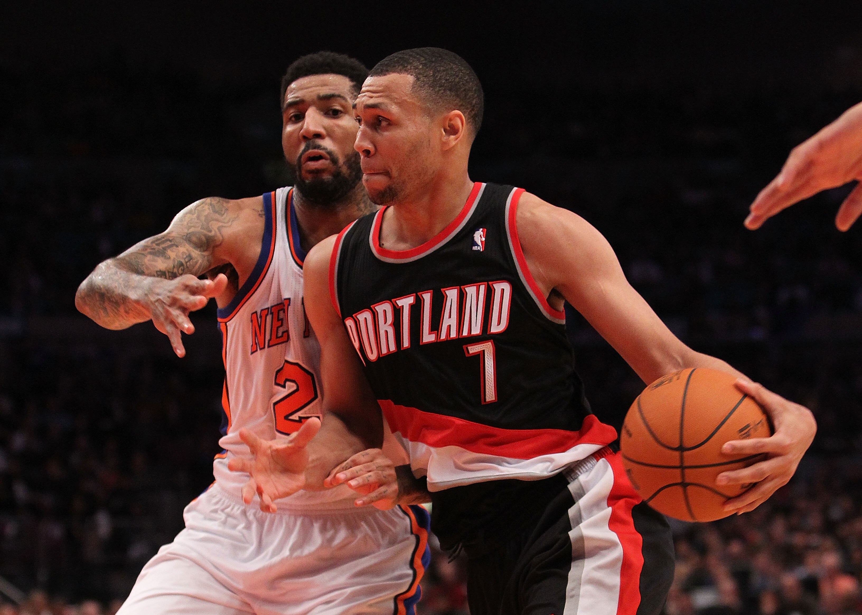 NEW YORK - OCTOBER 30:  Brandon Roy #7 of the Portland Trail Blazer drives to the basket against Wilson Chandler #21 of the New York Knicks at Madison Square Garden on October 30, 2010 in New York City. NOTE TO USER: User expressly acknowledges and agrees