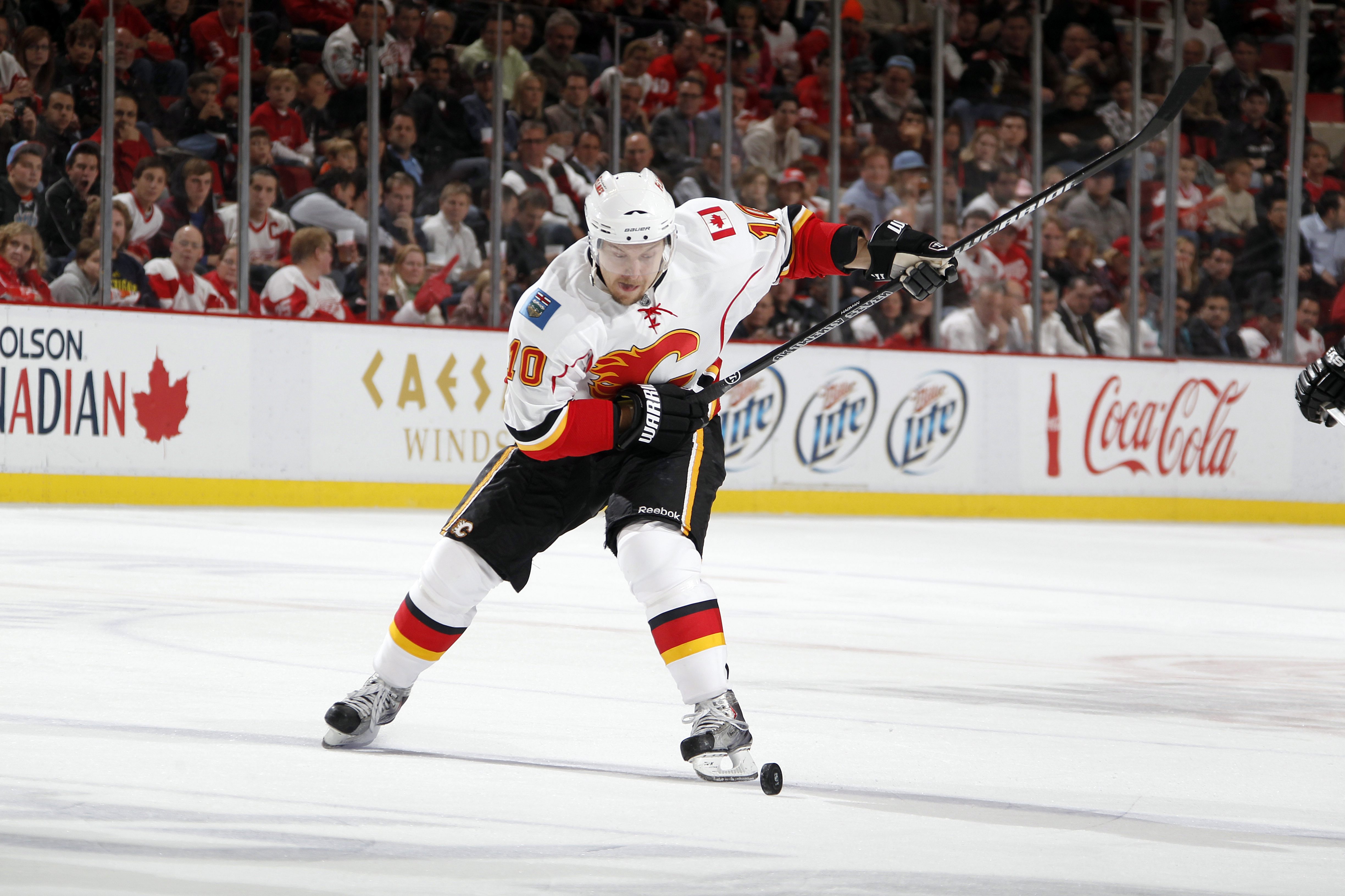 DETROIT - OCTOBER 21:  Niklas Hagman #10 of the Calgary Flames skates during a game against the Detroit Red Wings on October 21, 2010 at the Joe Louis Arena in Detroit, Michigan.  (Photo by Gregory Shamus/Getty Images)